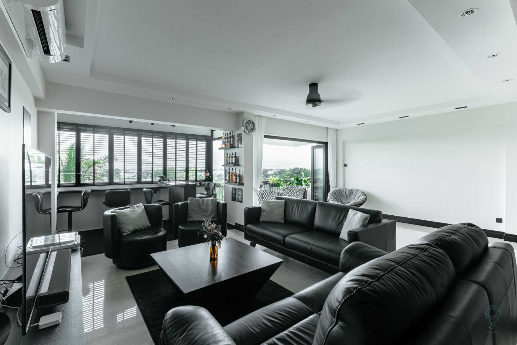 Modern Living Room with Bookshelf and Homogeneous Tiles
