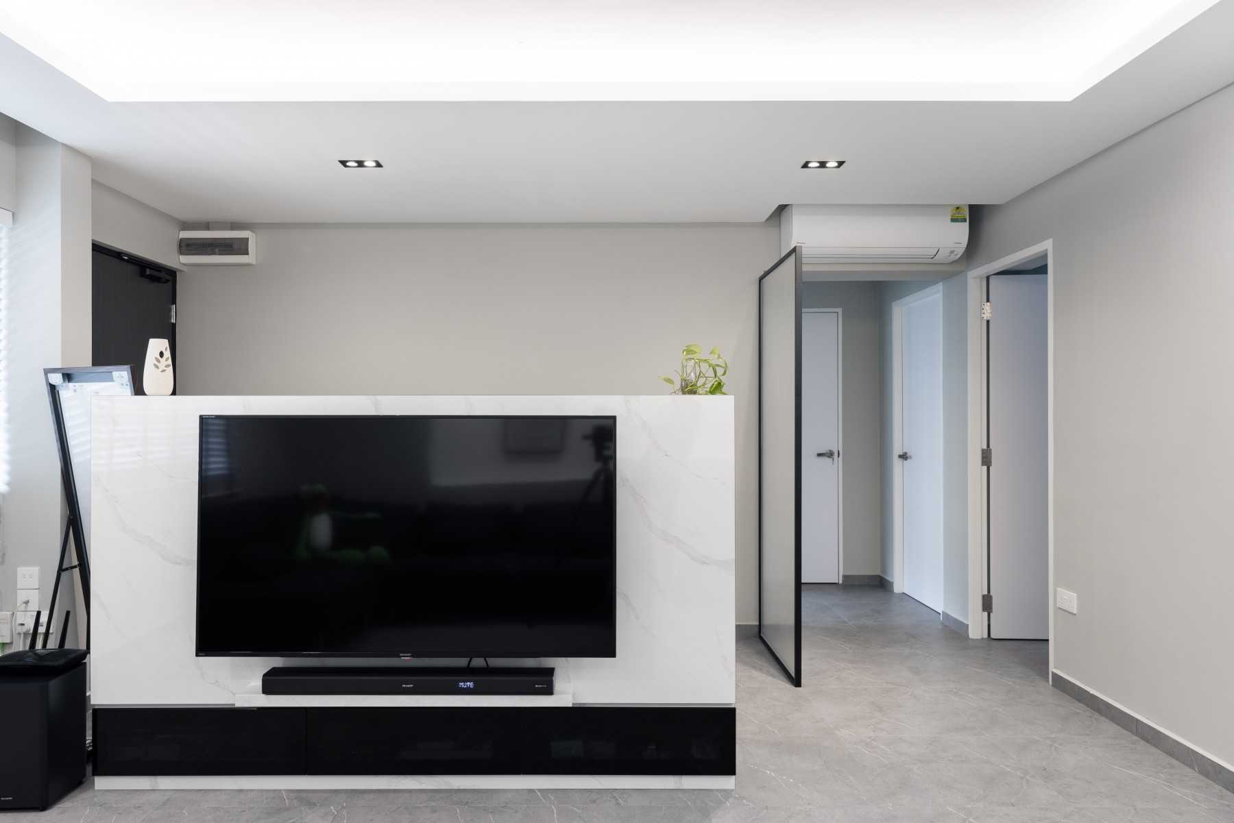 Minimalist Living Room with TV Console and Feature Wall