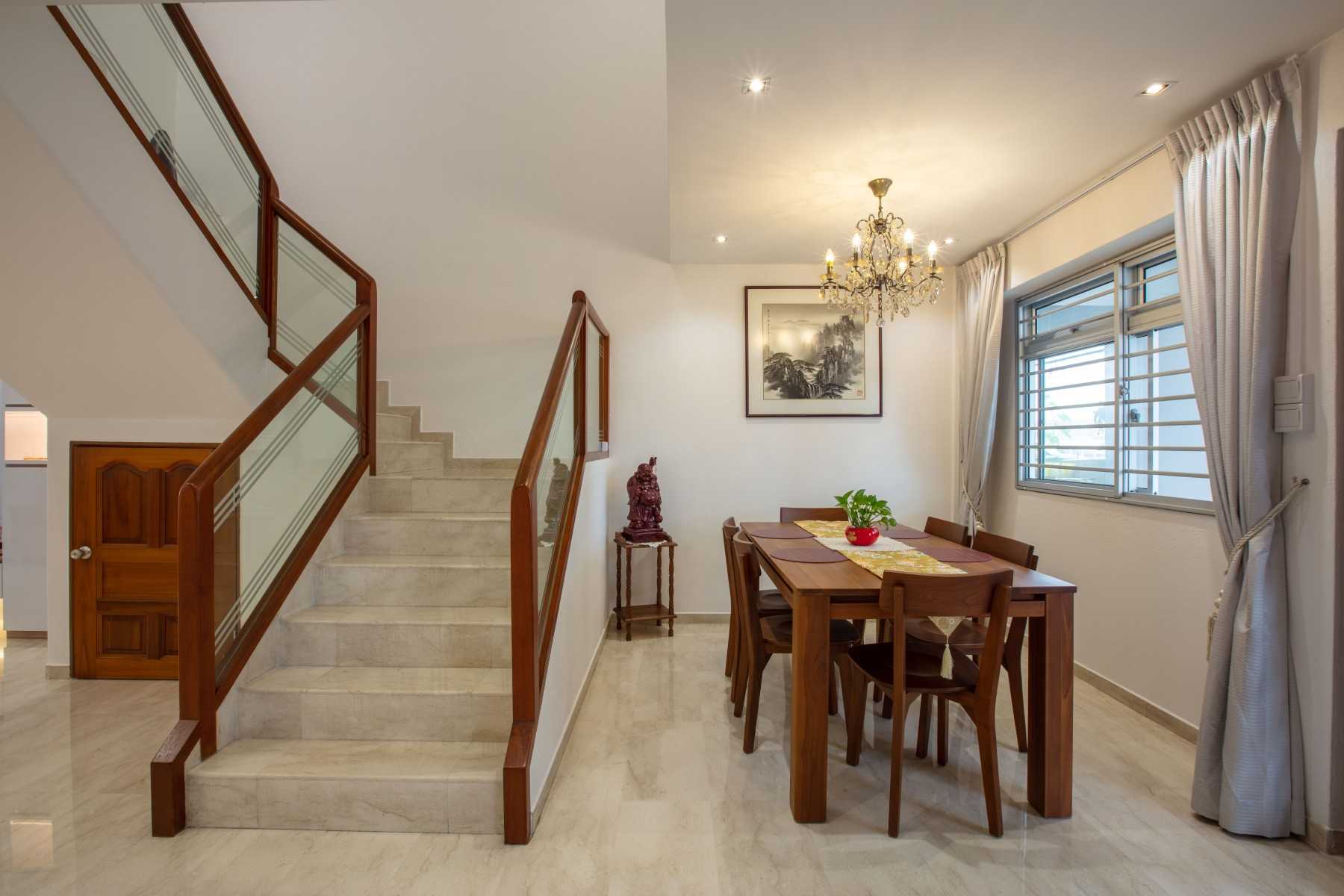 Asian Dining Room with Drop Light and Dining Table