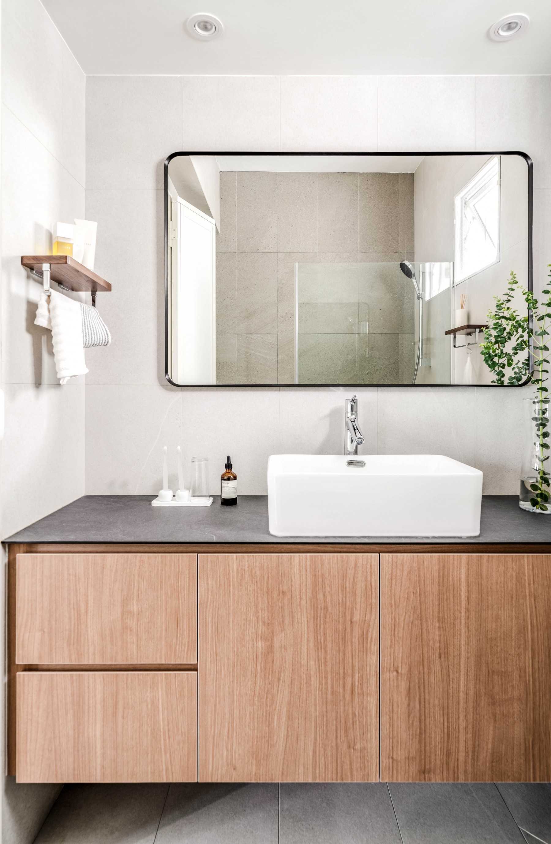 Scandinavian Bathroom with Countertop and Mirror