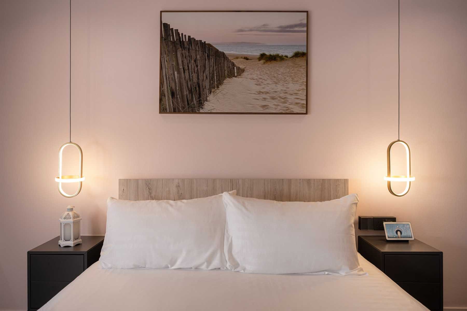 Modern Bedroom with Bedside Table and Paintings