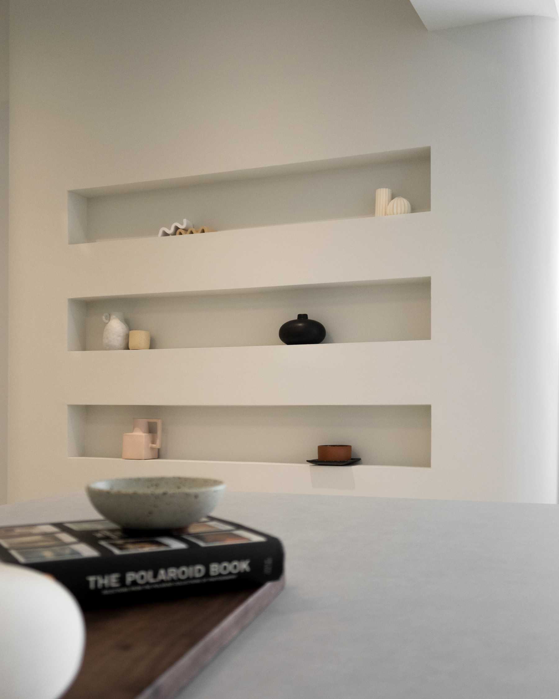 Scandinavian Living Room with Bookshelf and Feature Wall