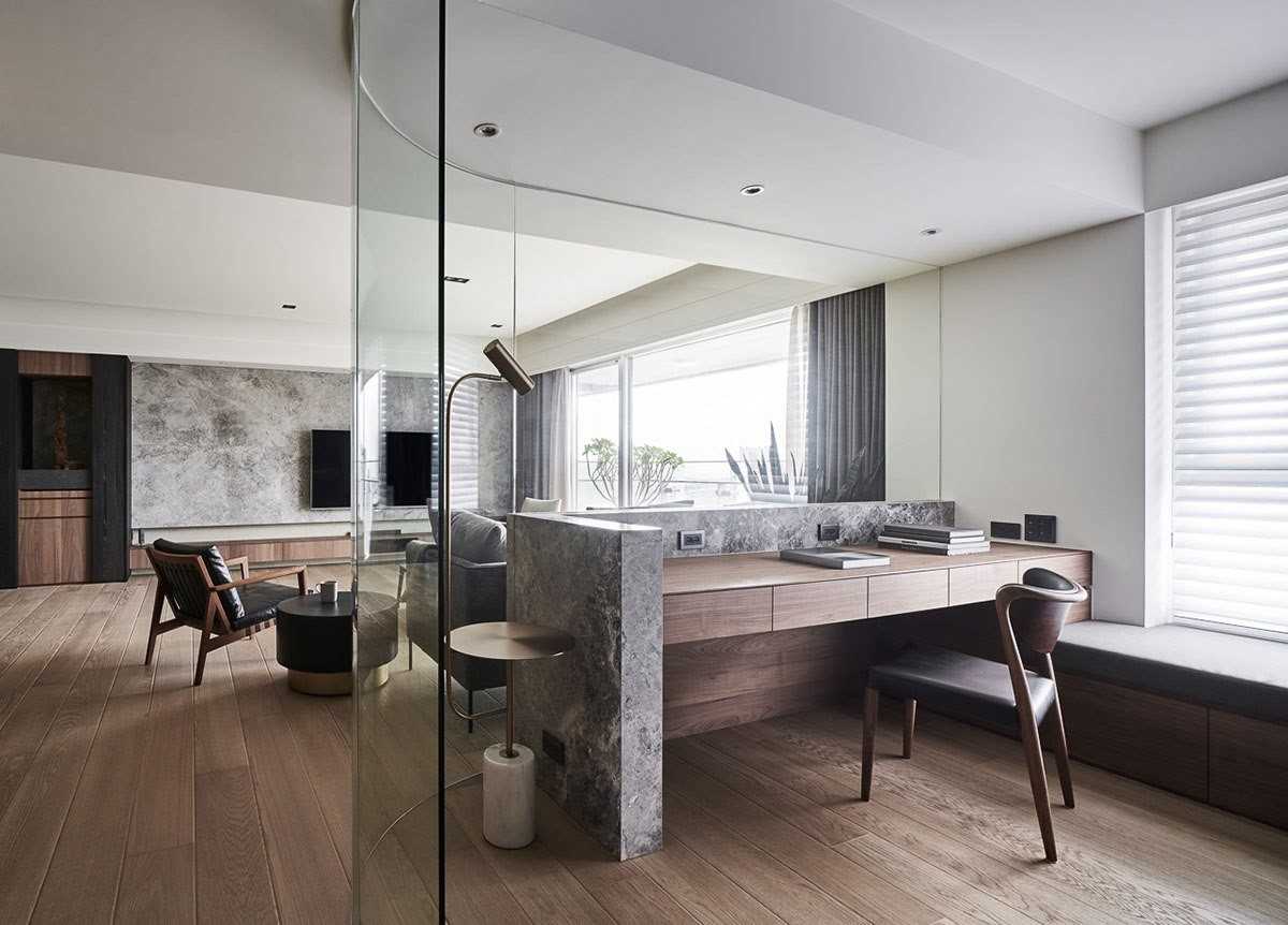 Contemporary Living Room with Bookshelf and Feature Wall