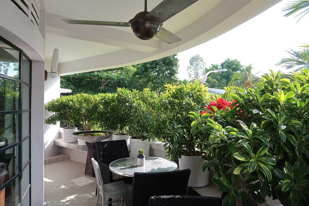 Modern Balcony with Window Grille and Outdoor Table