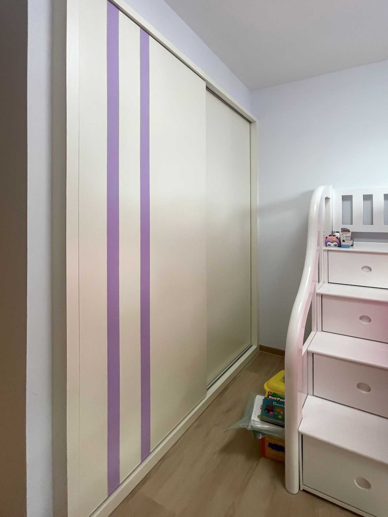 Scandinavian Kids Room with Wardrobe and Paintings