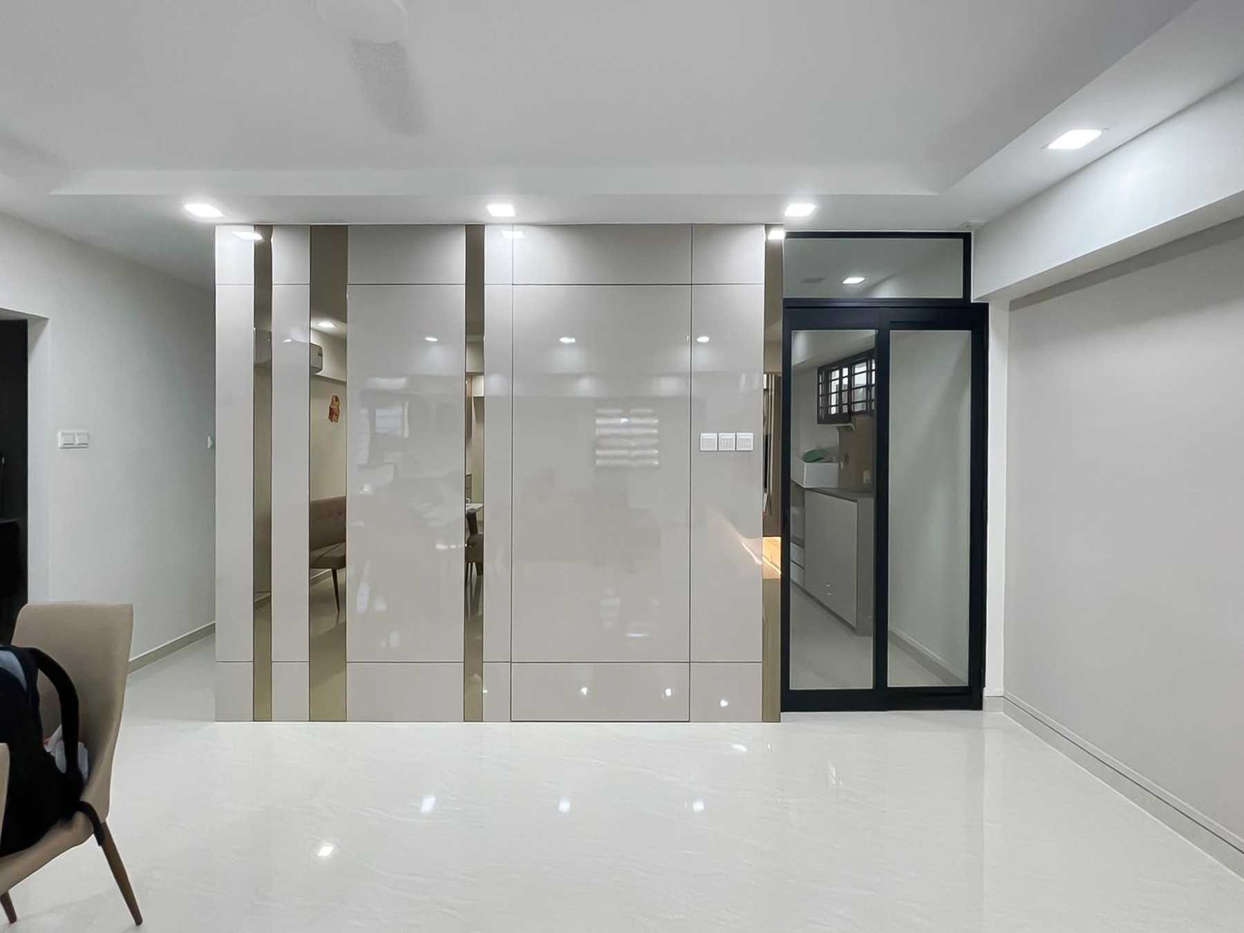 Modern Foyer with Glass Door and Paintings