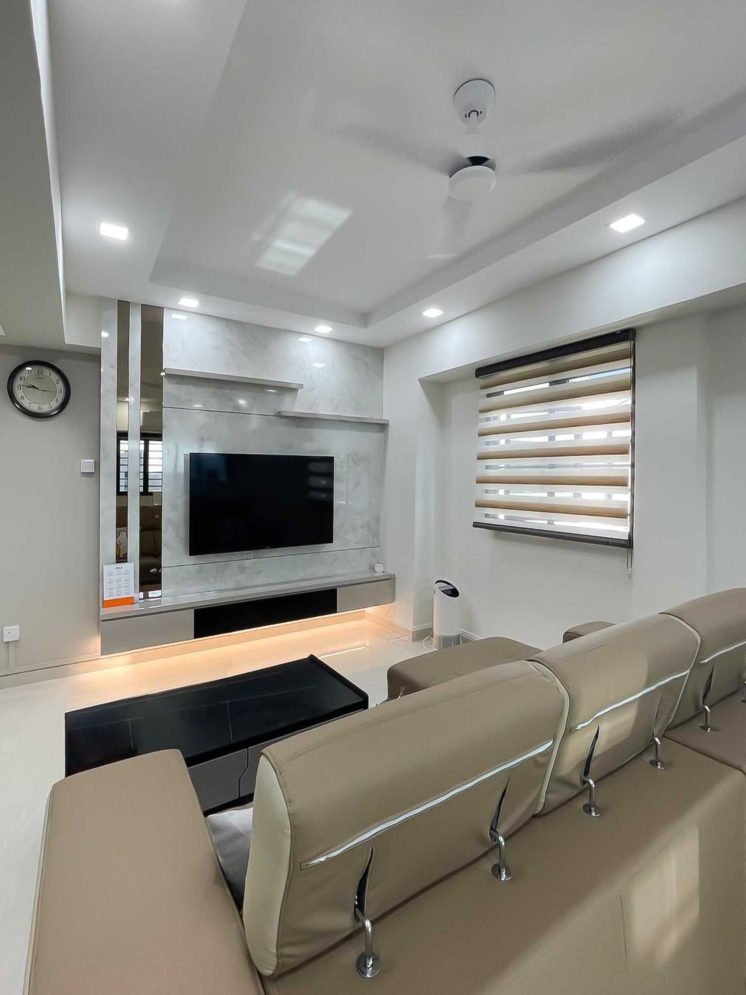 Modern Living Room with TV Console and Window Grille