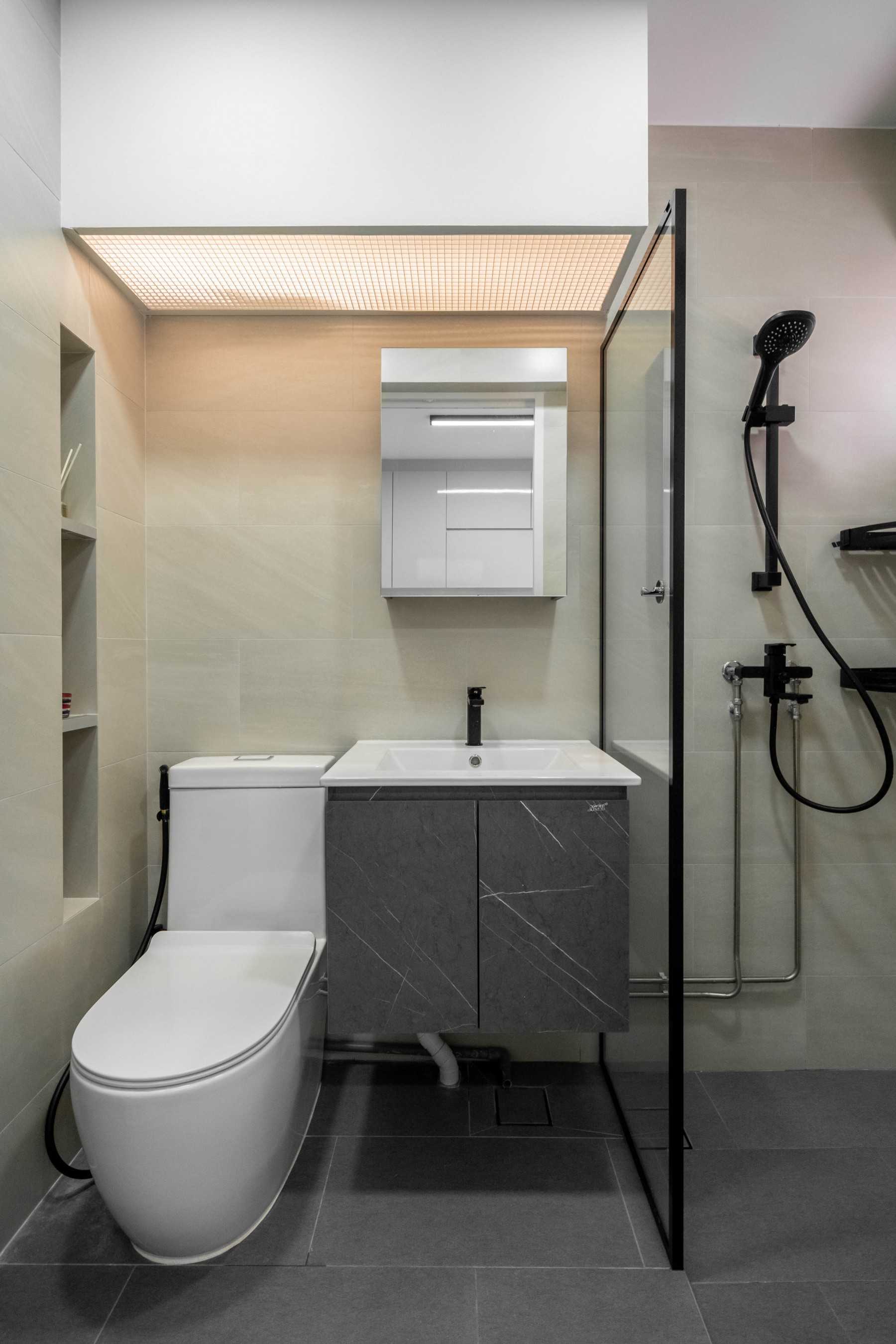 Modern Bathroom with Homogeneous Tiles and Mirror