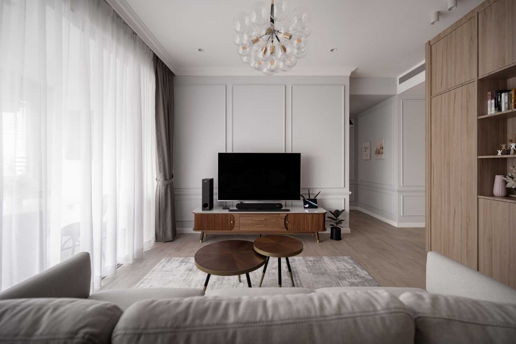 Modern Living Room with TV Console and Drop Light