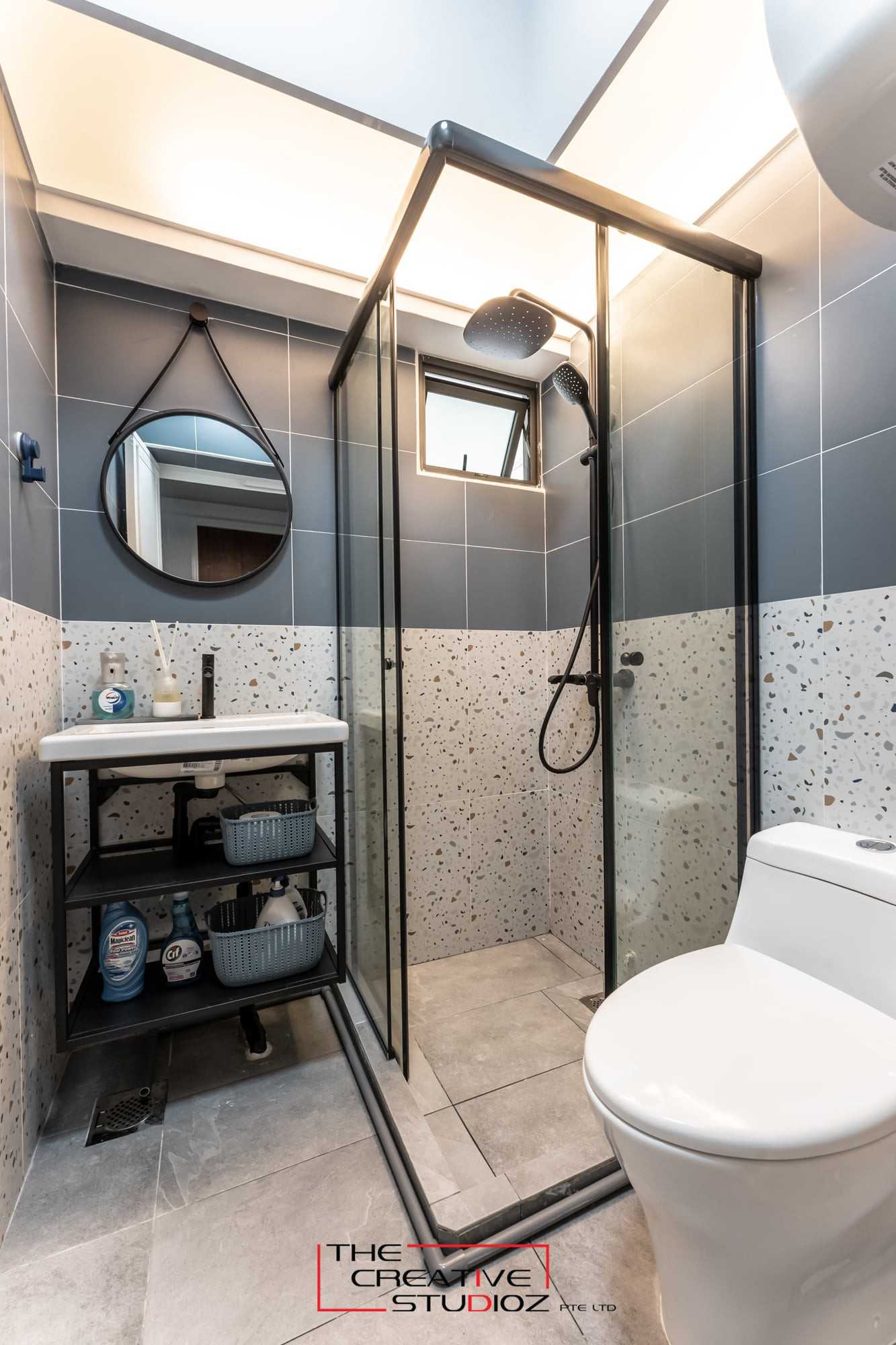 Scandinavian Bathroom with Homogeneous Tiles and Shower Screen