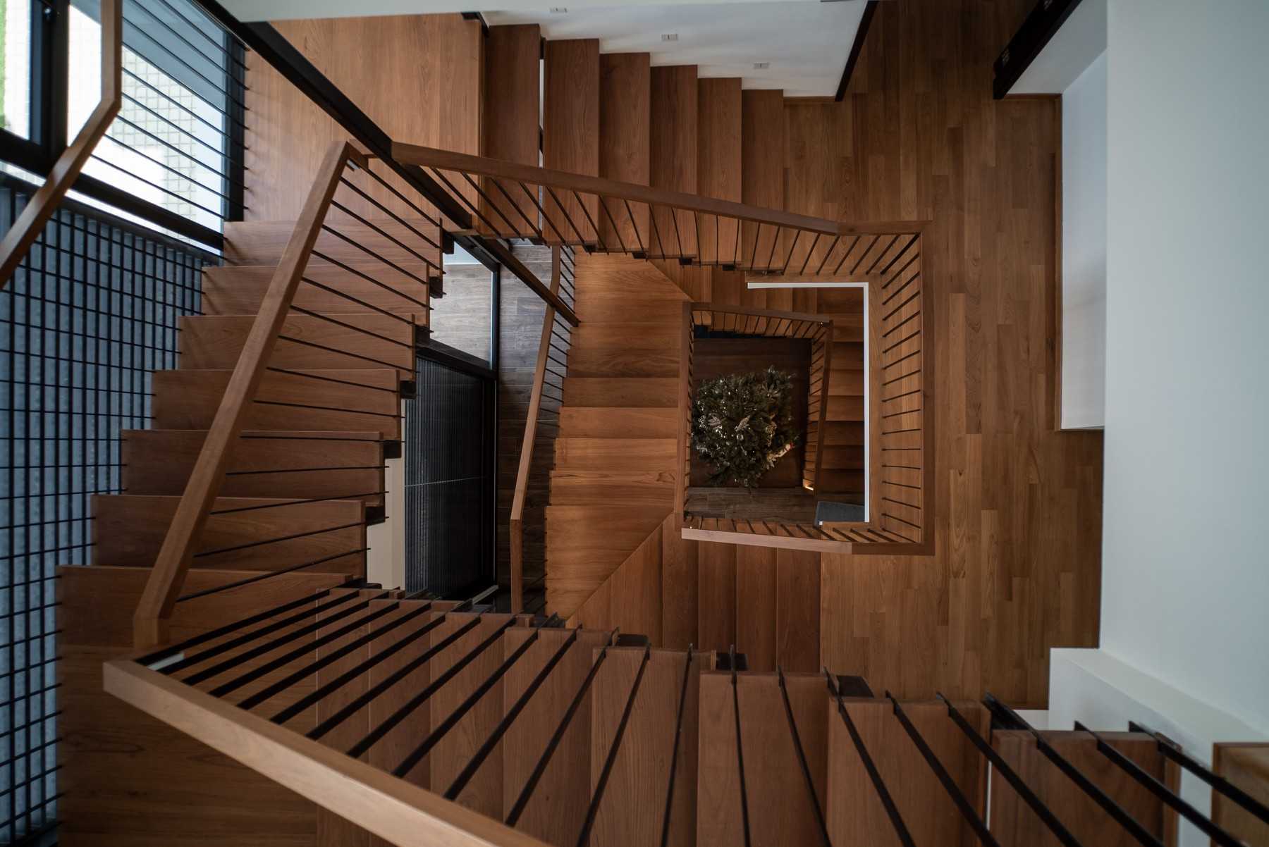Contemporary Hallway with Staircase and Artwork
