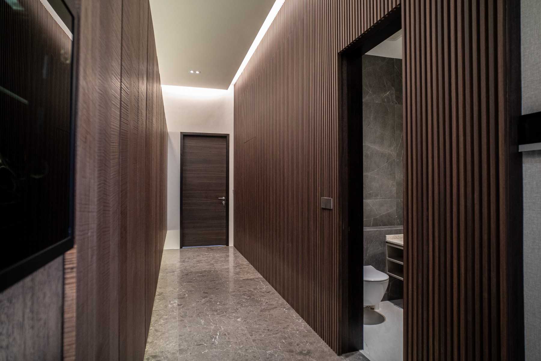 Contemporary Foyer with Marble Floor and Feature Wall