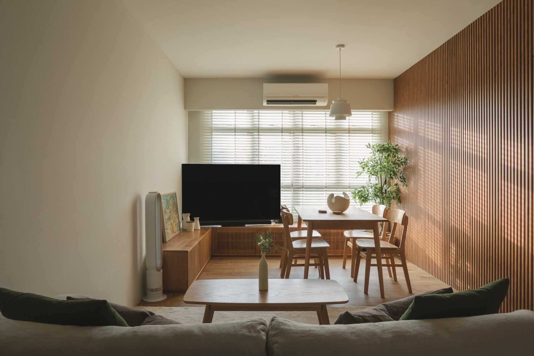 Modern Living Room with TV Console and Drop Light