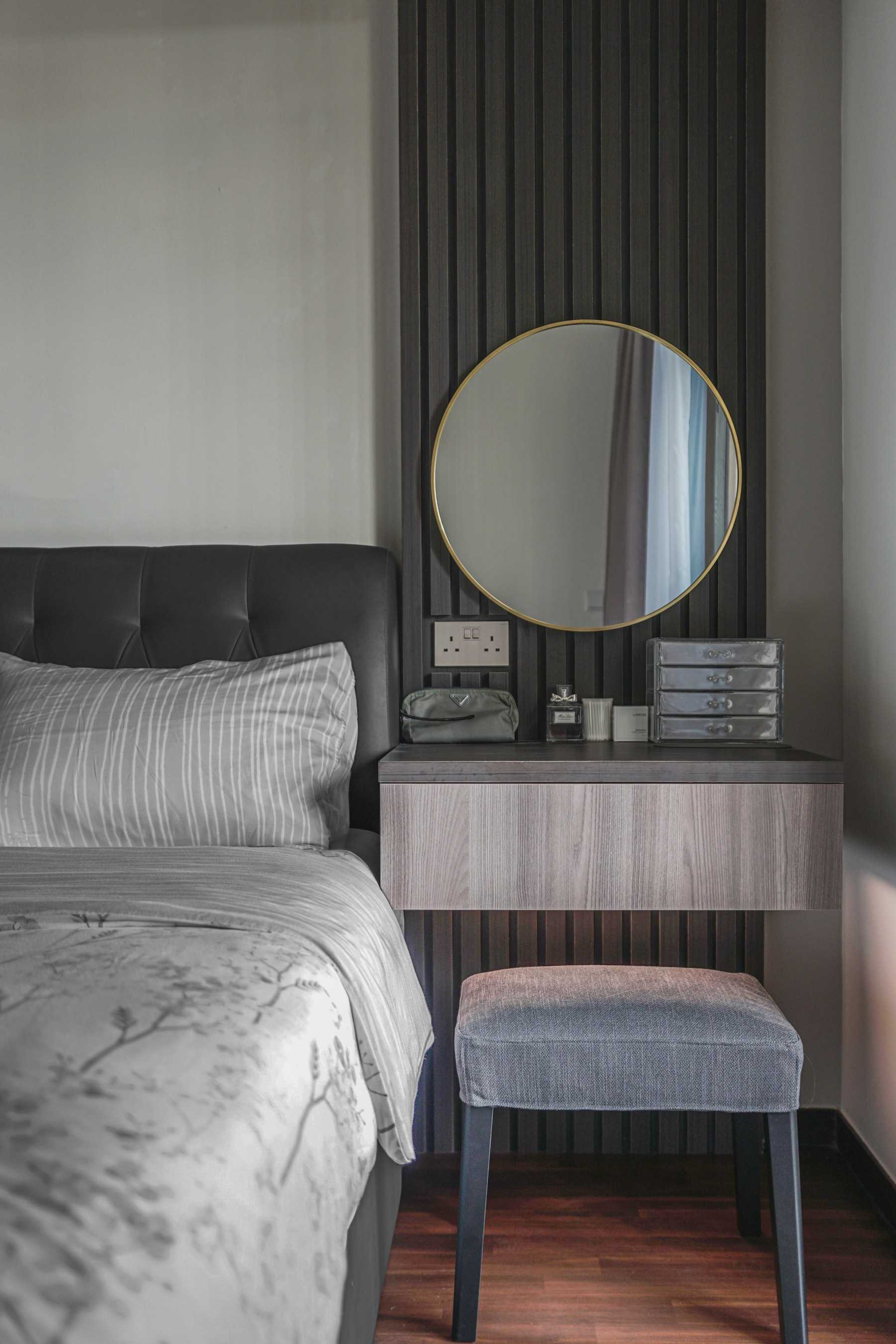 Modern Bedroom with Wood Flooring and Ceiling Light