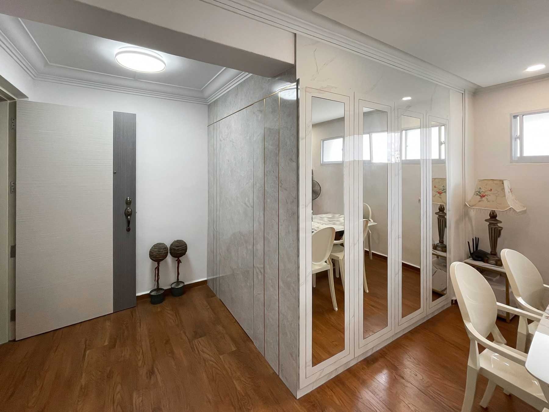 Scandinavian Foyer with Mirror and Storage Cabinets