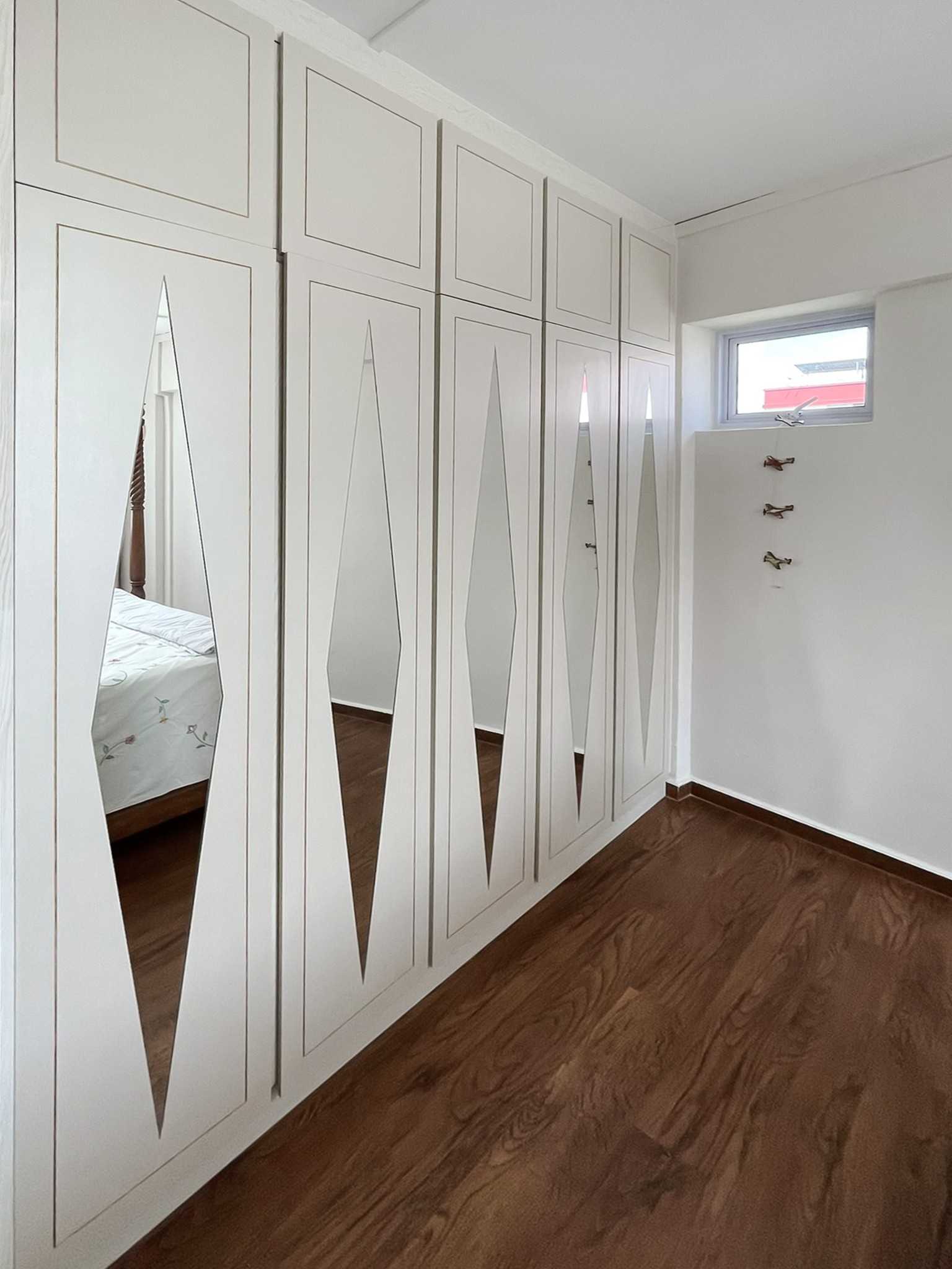 Scandinavian Bedroom with Wardrobe and Window Grille