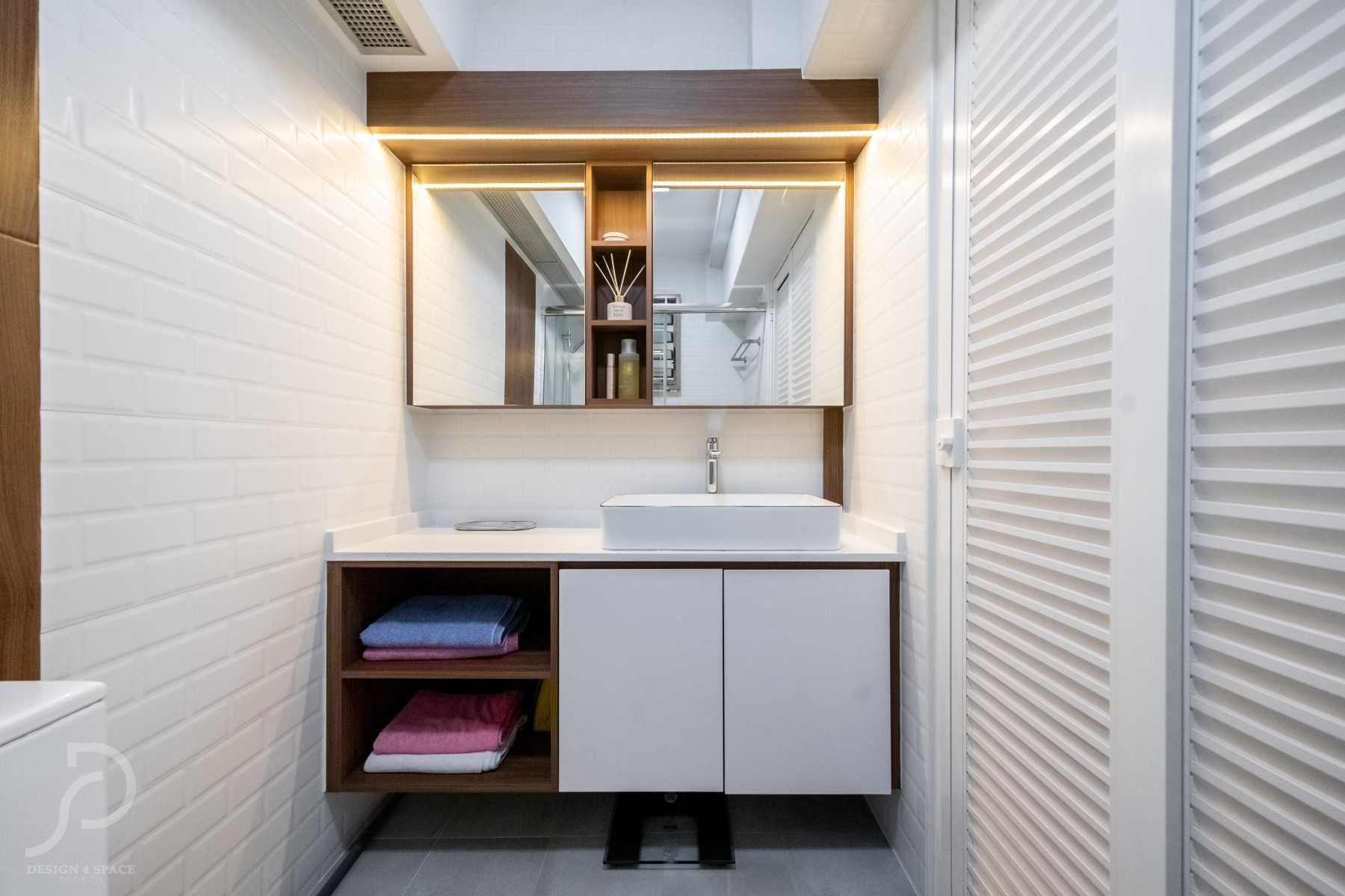 Contemporary Bathroom with Herringbone Tiling and Mirror