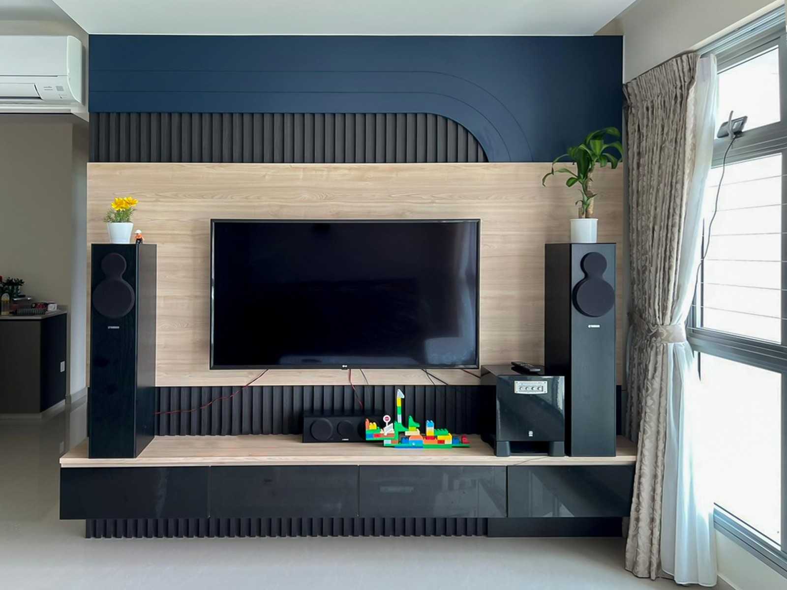 Modern Living Room with TV Console and Window Grille
