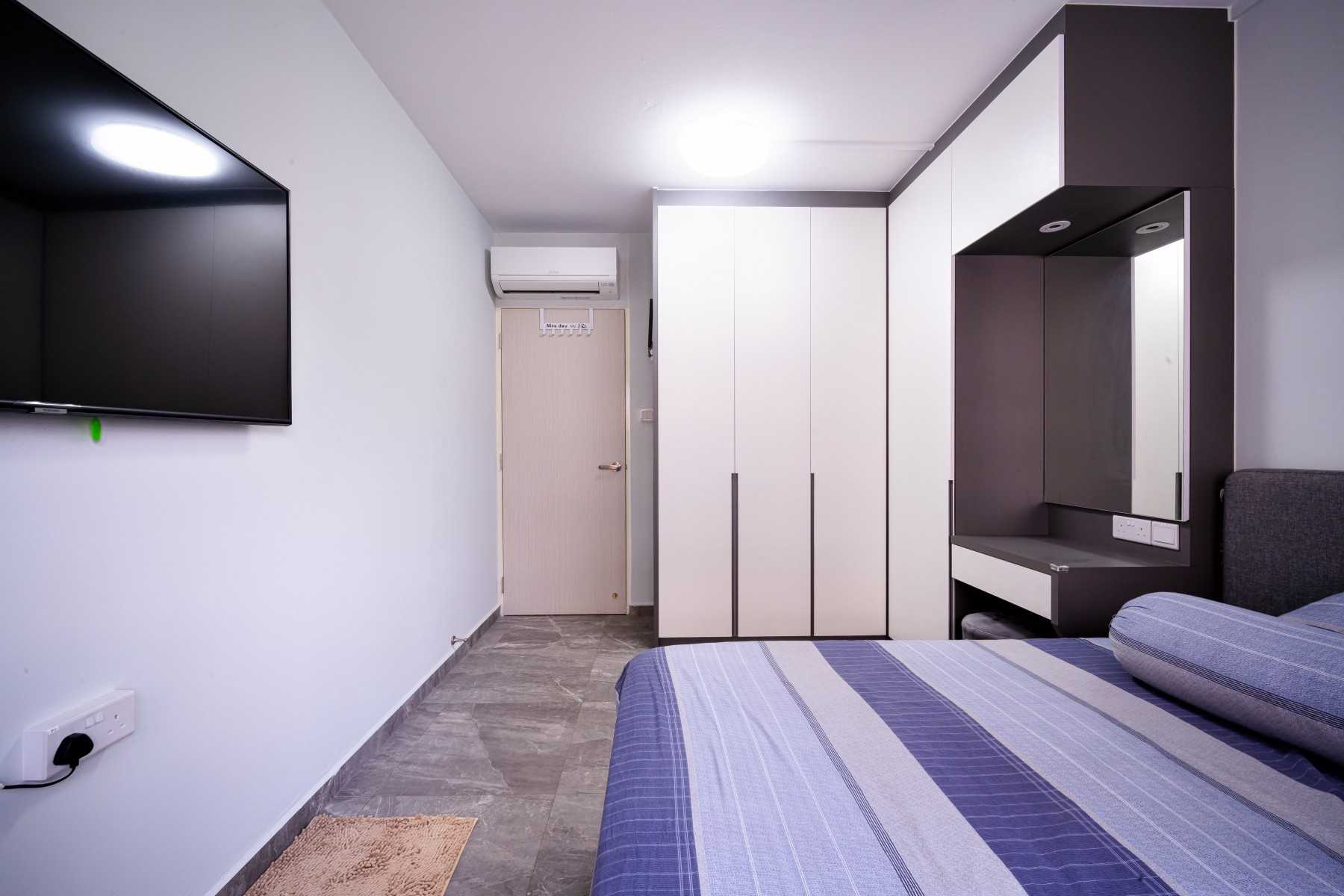 Minimalist Bedroom with Ceiling Light and Wardrobe
