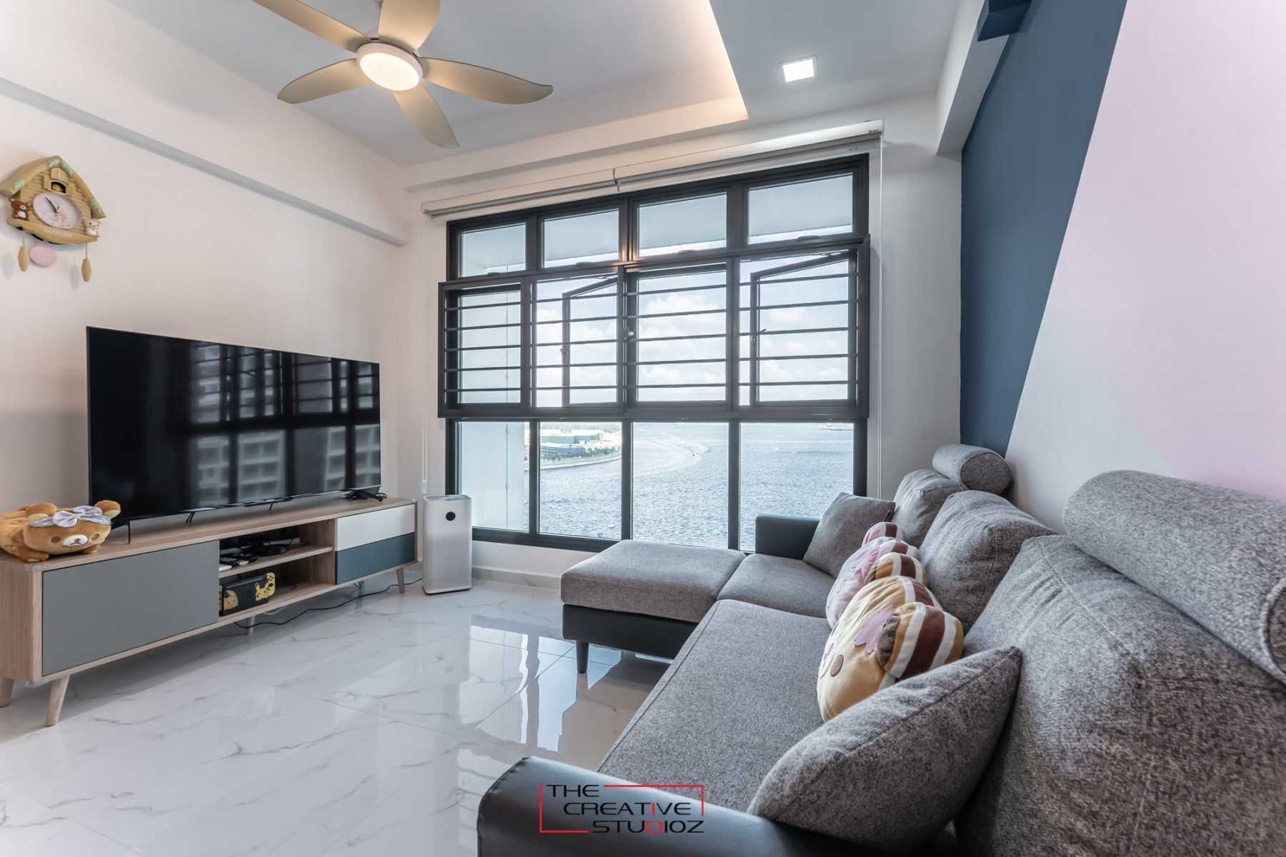 Scandinavian Living Room with Homogeneous Tiles and TV Console
