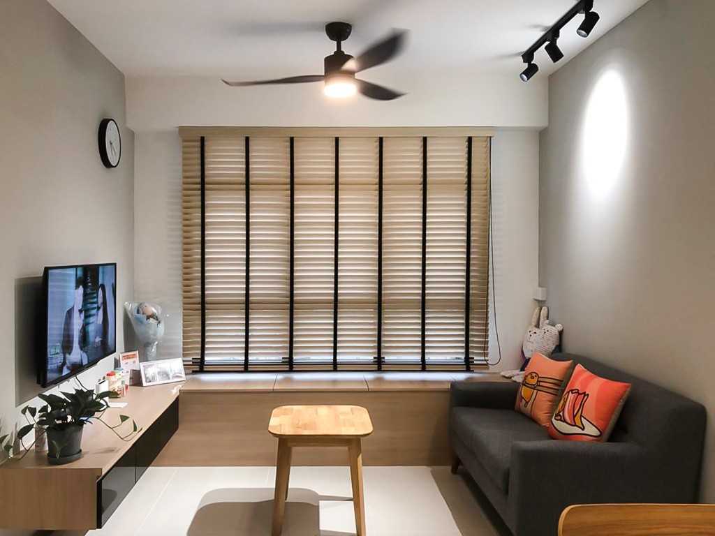 Scandinavian Living Room with TV Console and Window Seat
