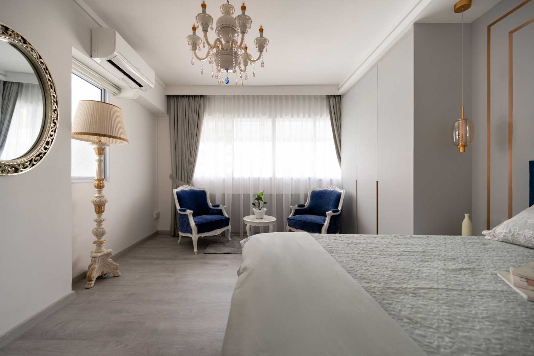 Modern Bedroom with Wardrobe and Chandelier
