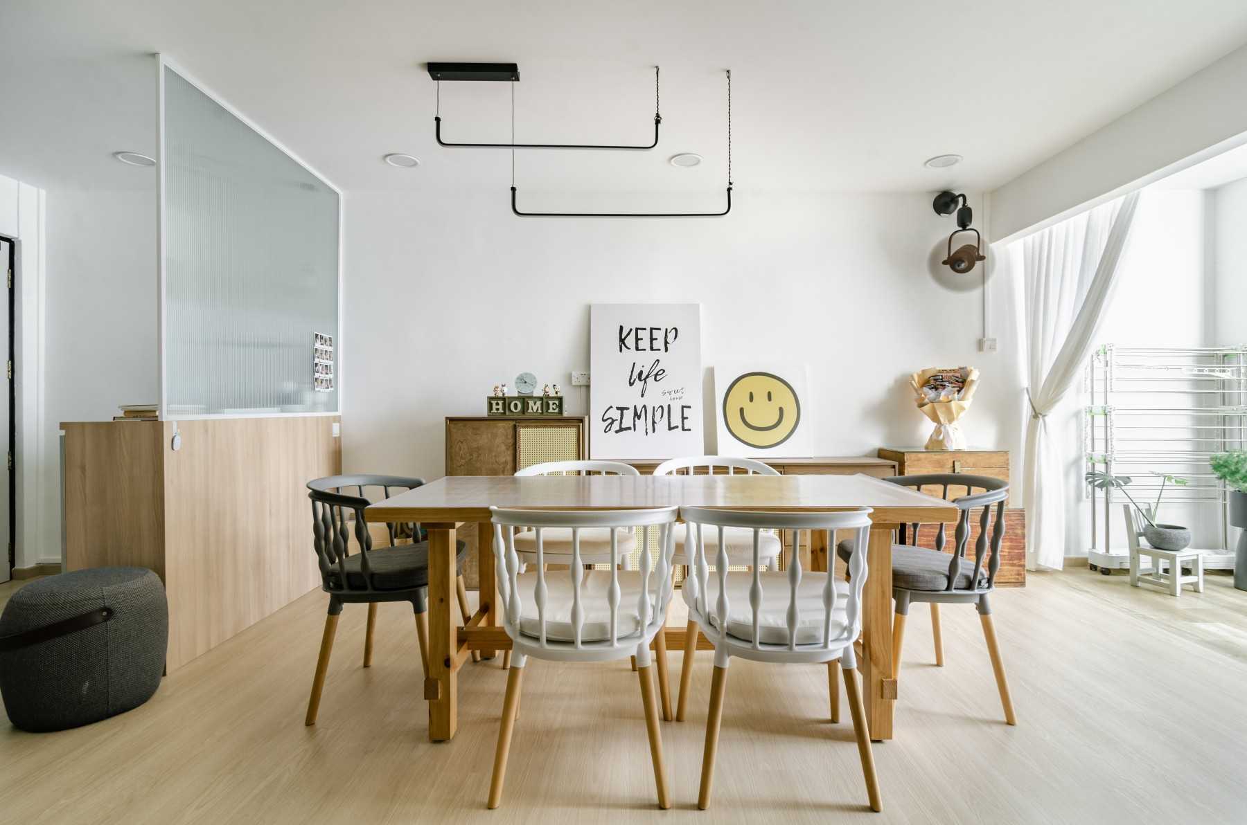 Scandinavian Dining Room with Ceiling Light and Dining Table