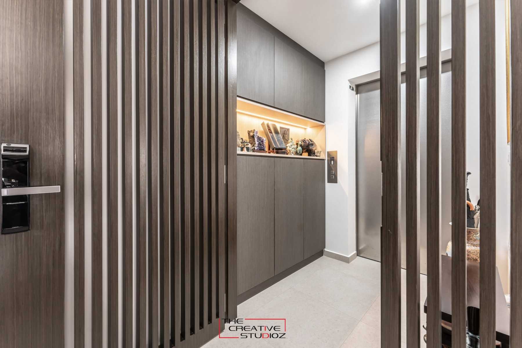 Contemporary Foyer with Artwork and Console Table