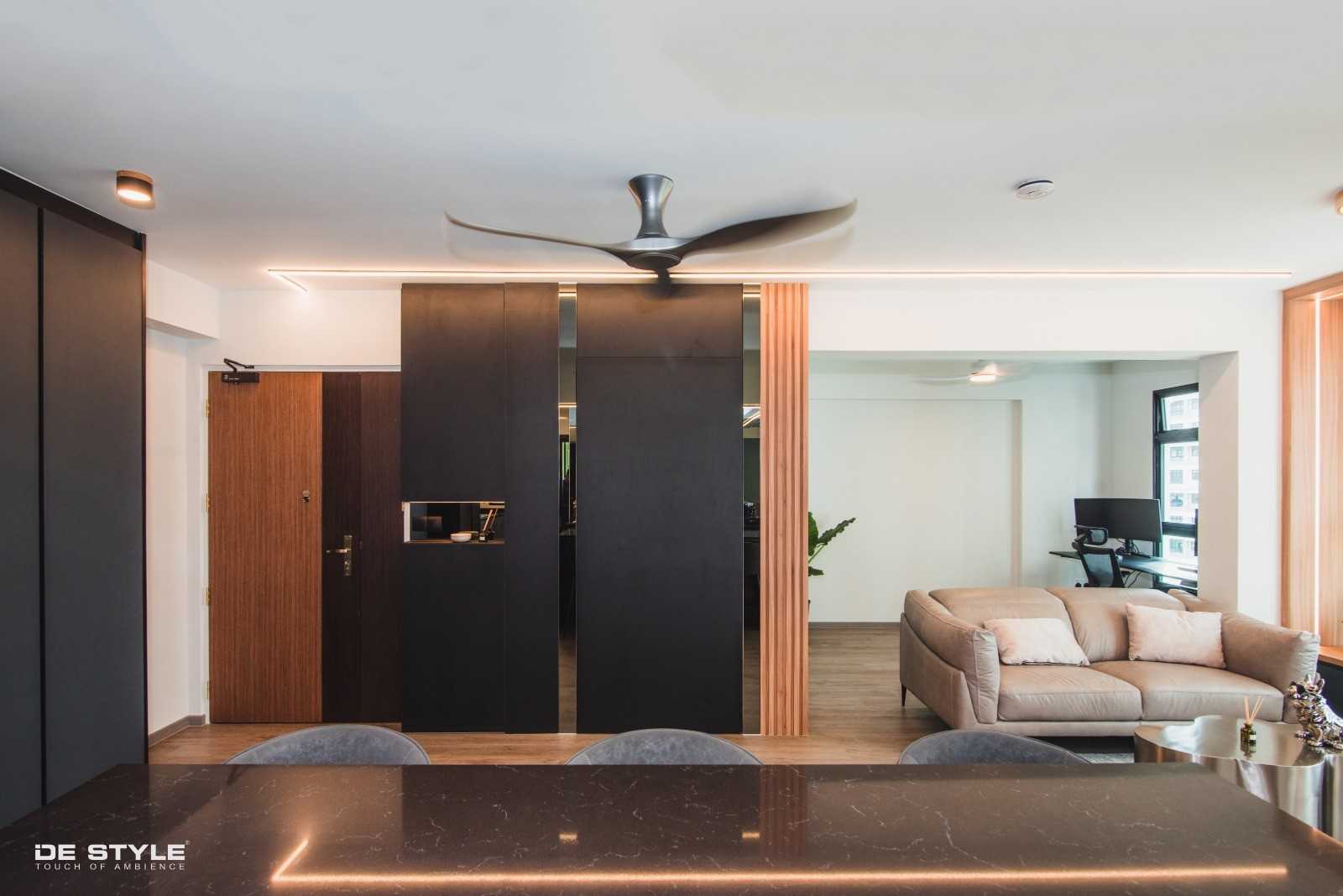 Contemporary Foyer with Artwork and Console Table