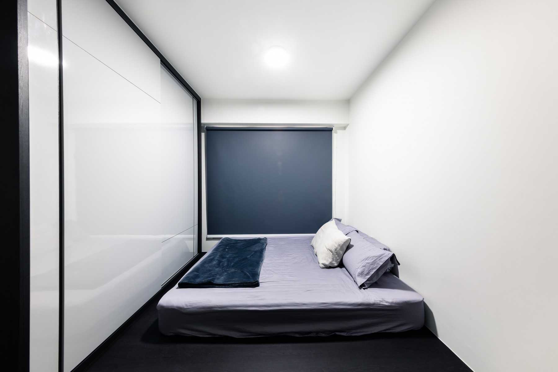 Modern Bedroom with Ceiling Light and Wardrobe