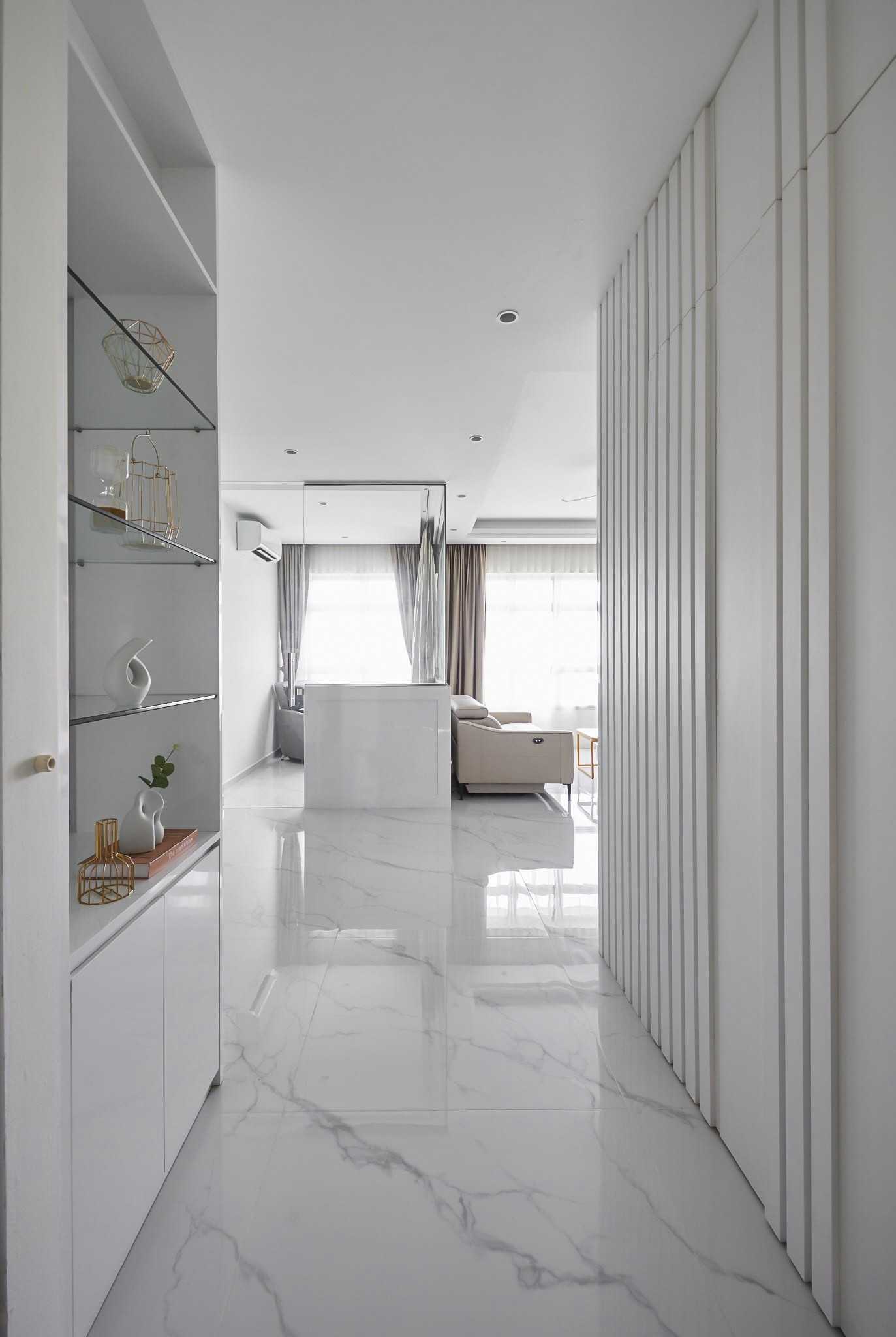 Modern Entryway with Paintings and Storage Cabinets