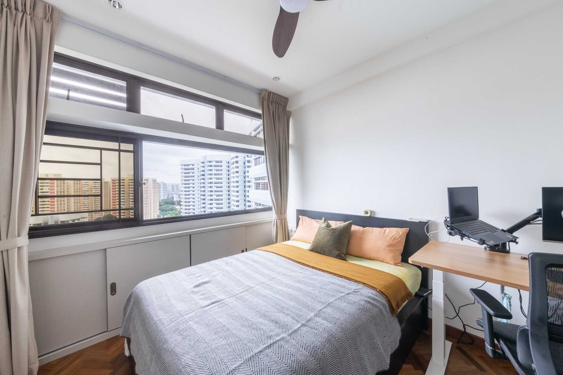 Modern Bedroom with Ceiling Fan and Curtain