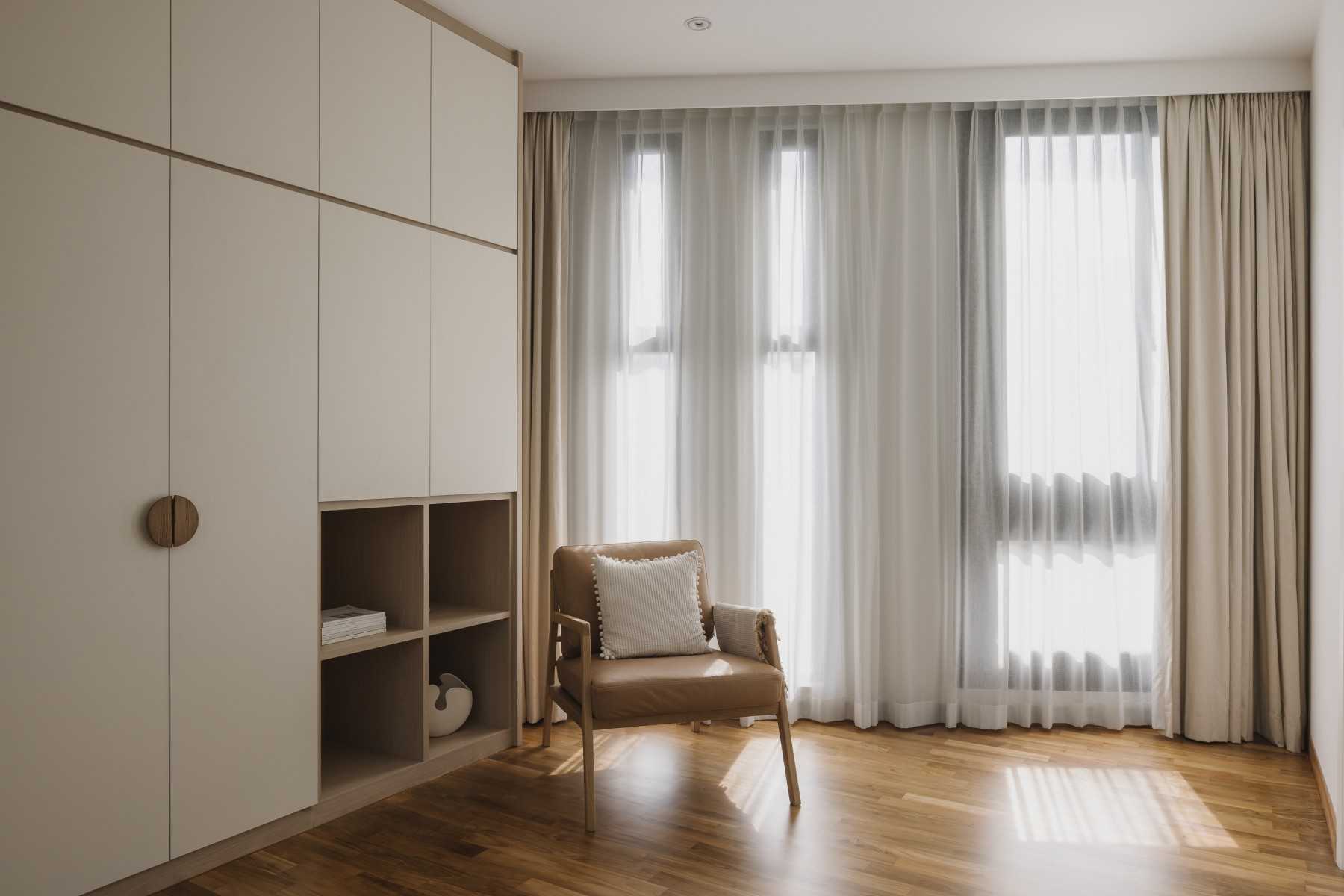 Minimalist Bedroom with Parquet Floor and Wardrobe