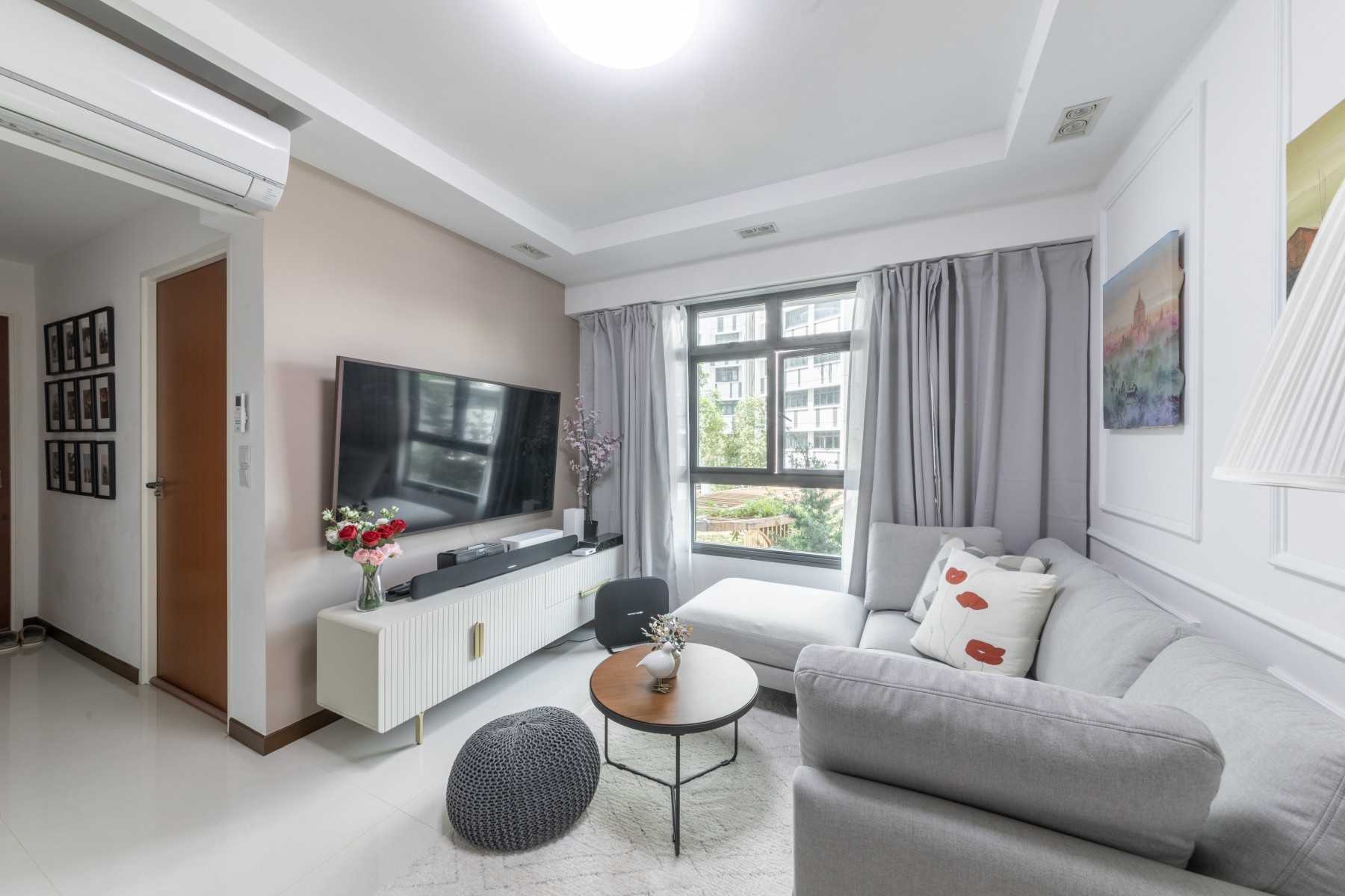 Minimalist Living Room with TV Console and Curtain