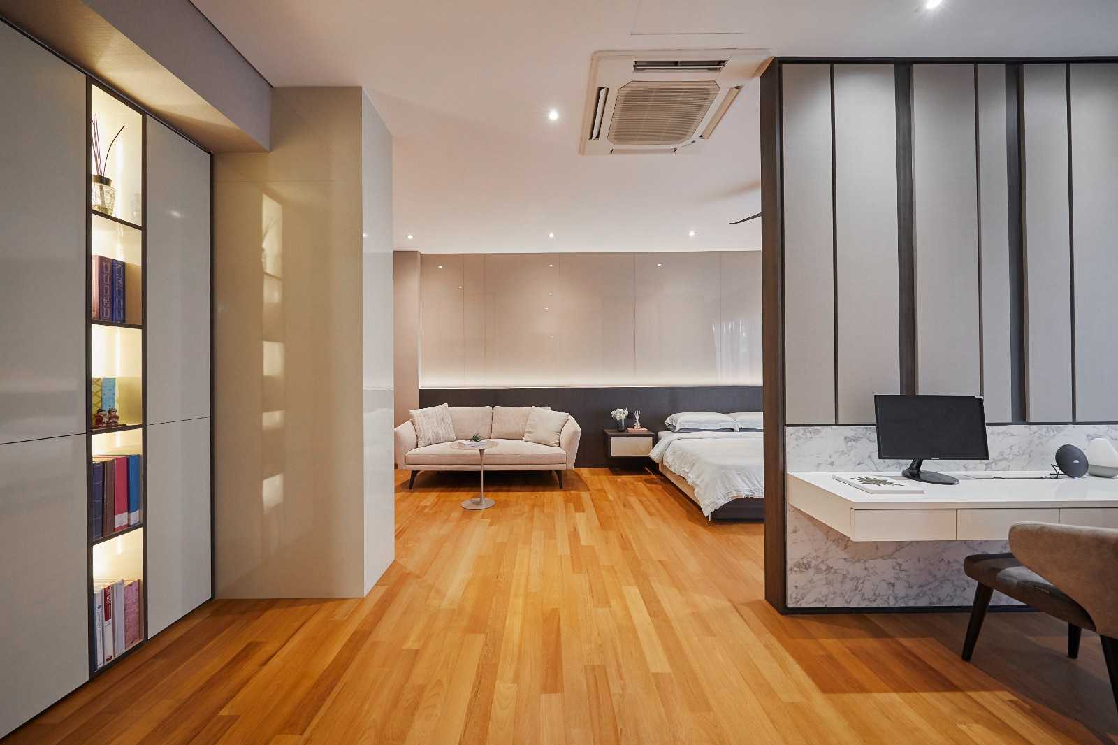 Modern Bedroom with Paintings and Desk