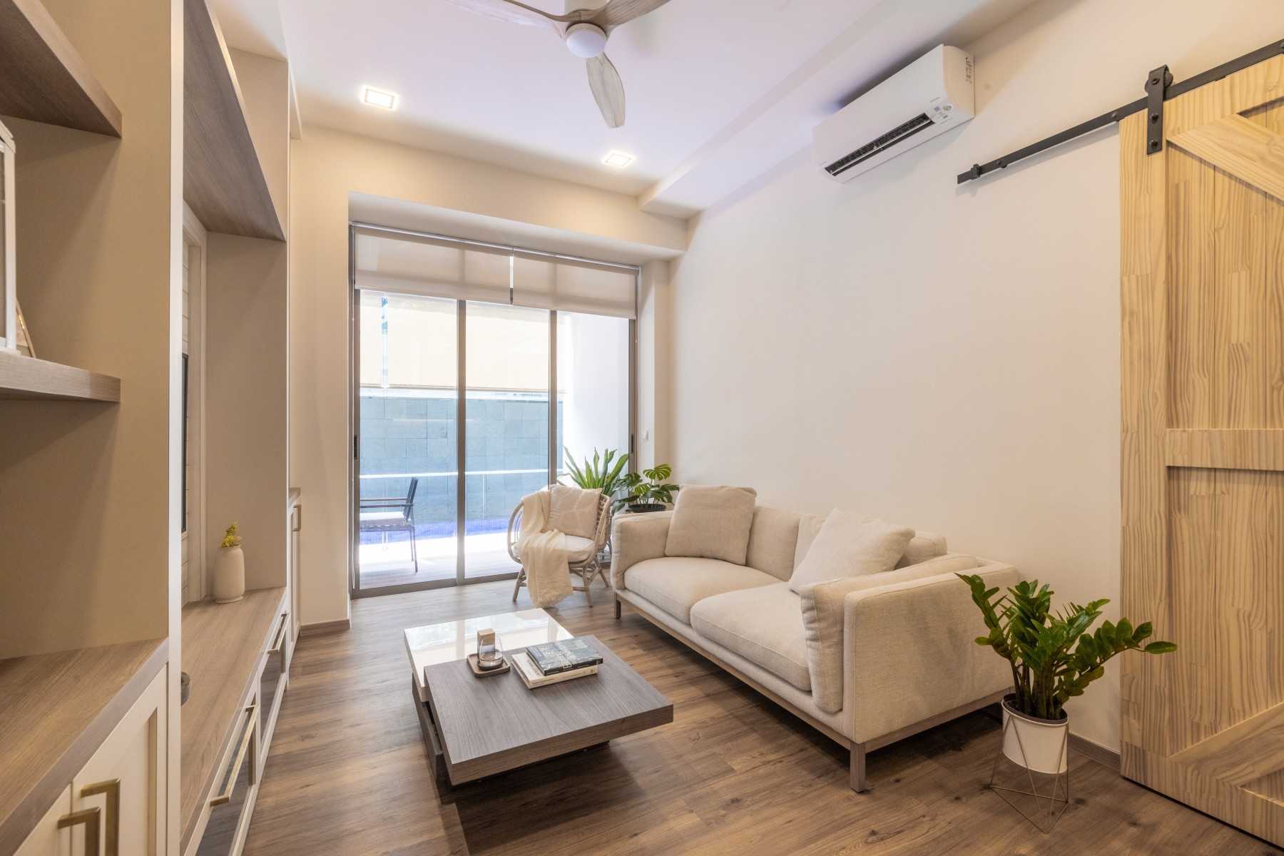Country Living Room with Ceiling Fan and Sofa