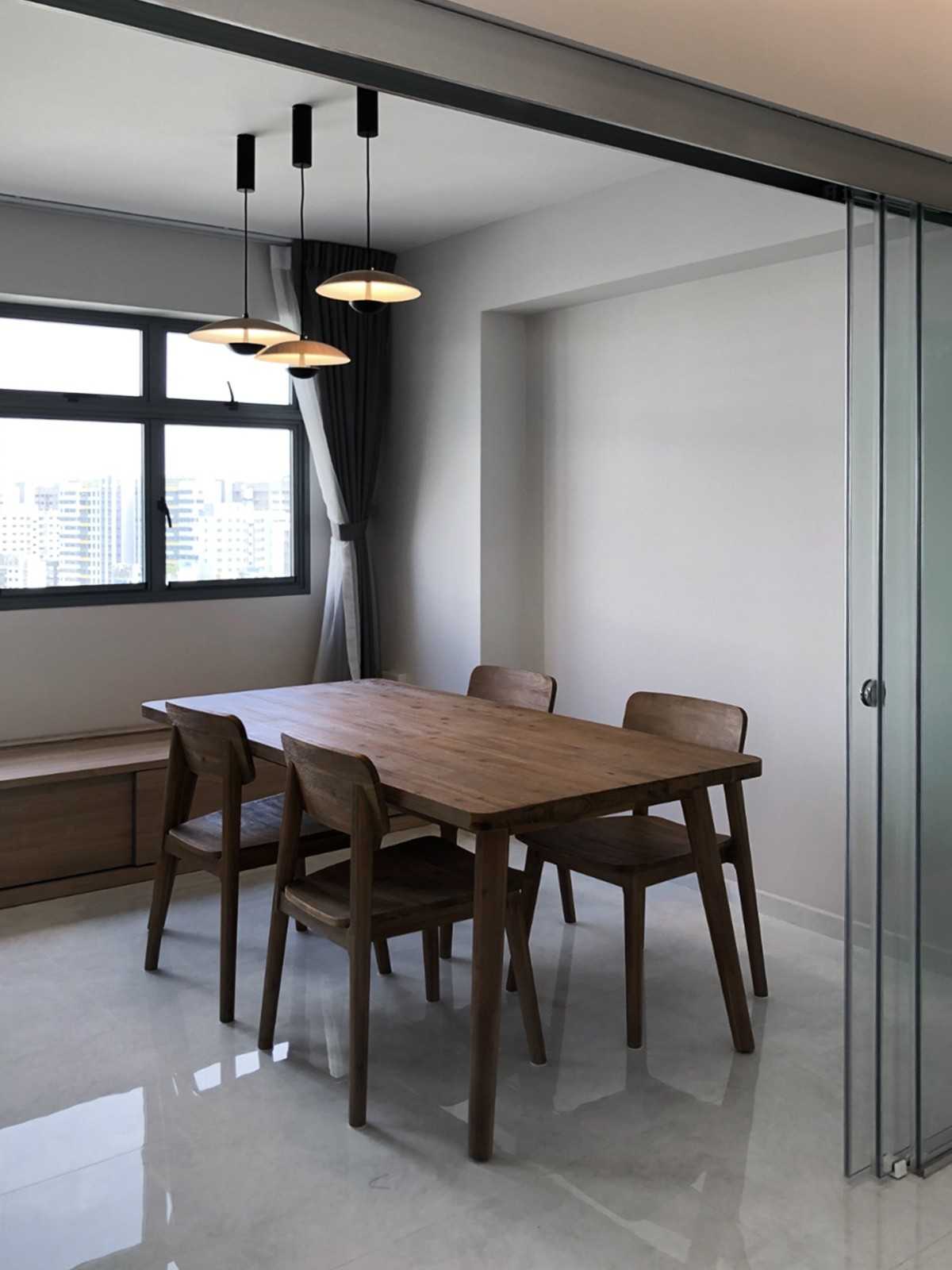 Scandinavian Dining Room with Window Seat and Window Grille