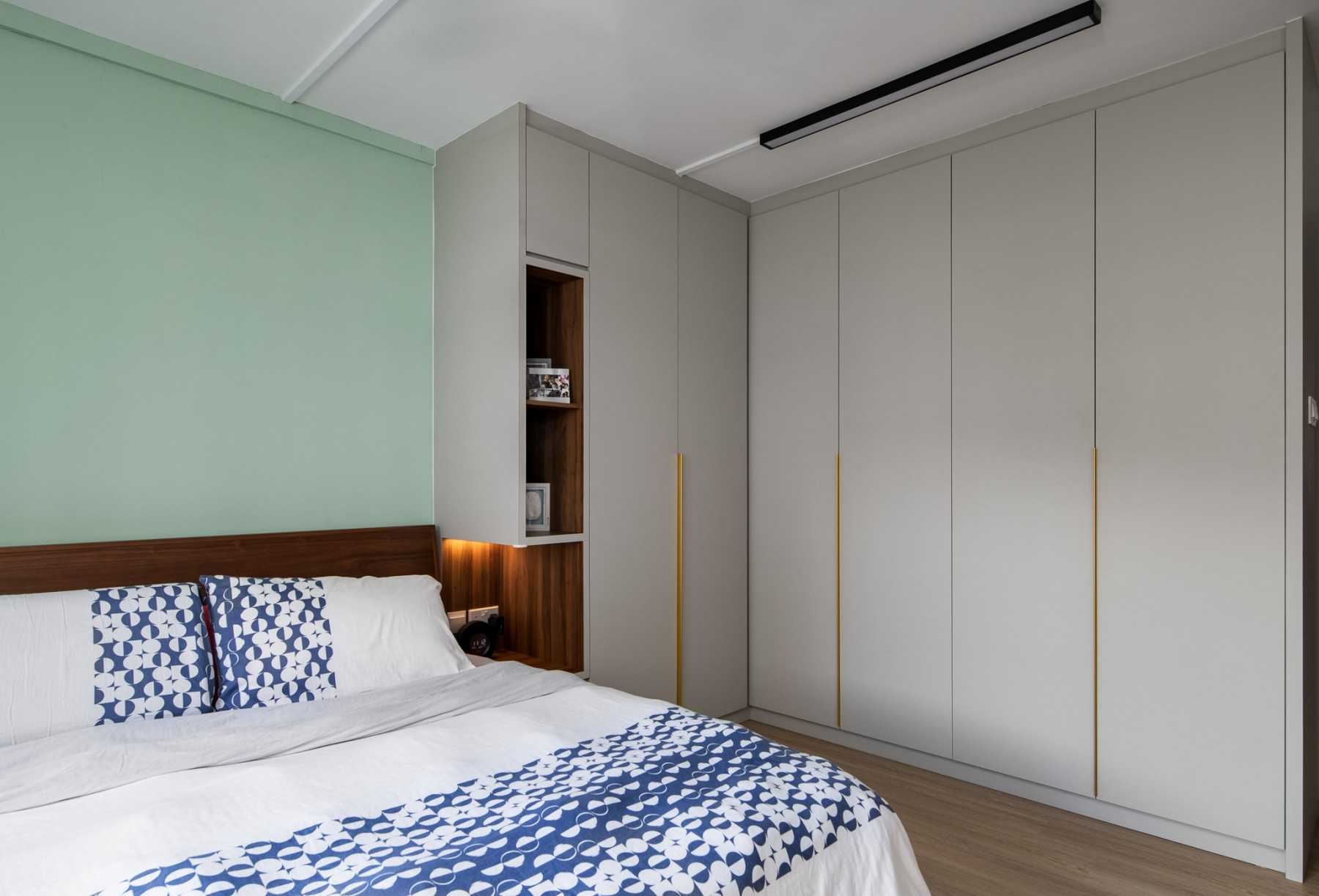 Contemporary Bedroom with Bookshelf and Vinyl Flooring