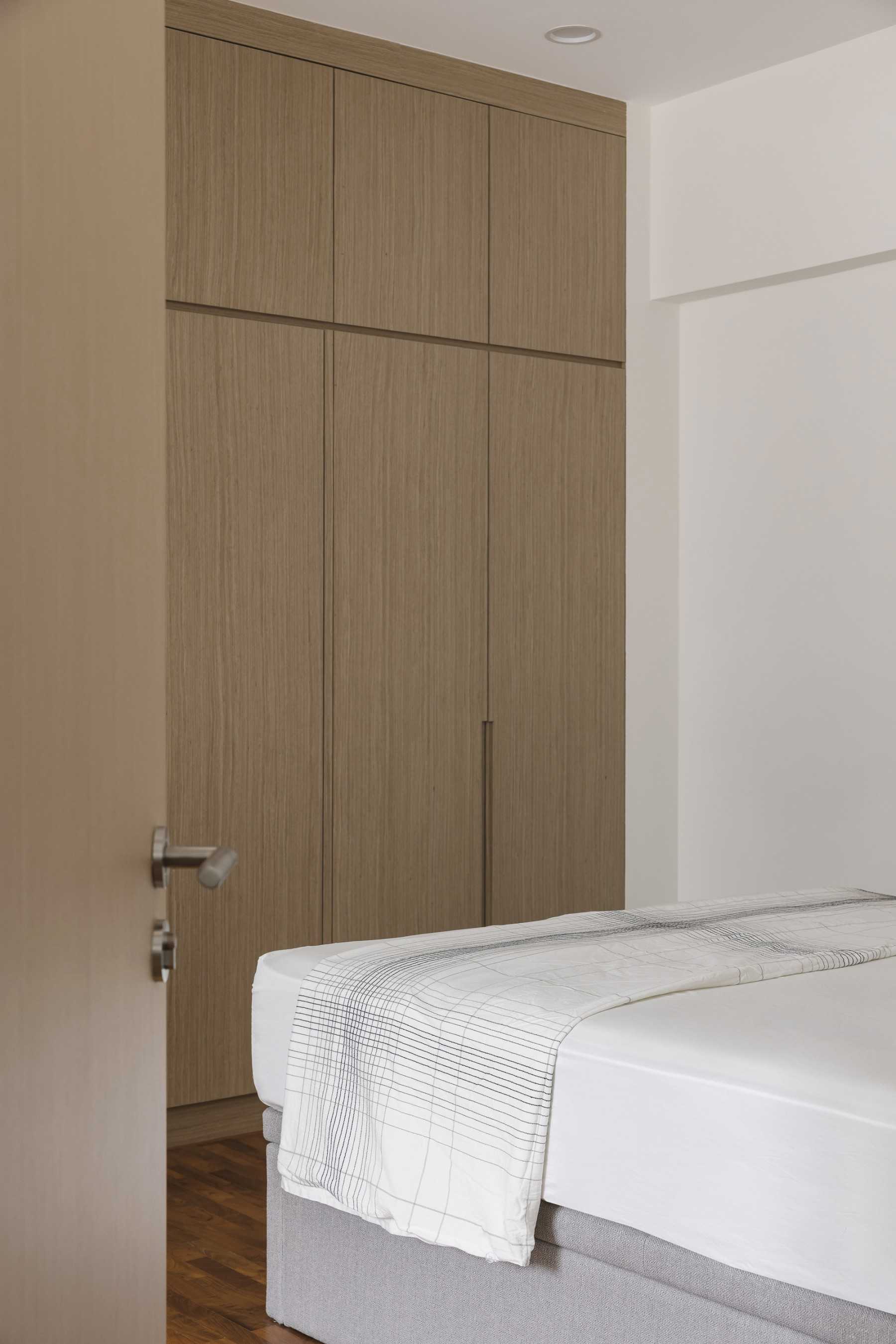 Modern Bedroom with Parquet Floor and Wardrobe