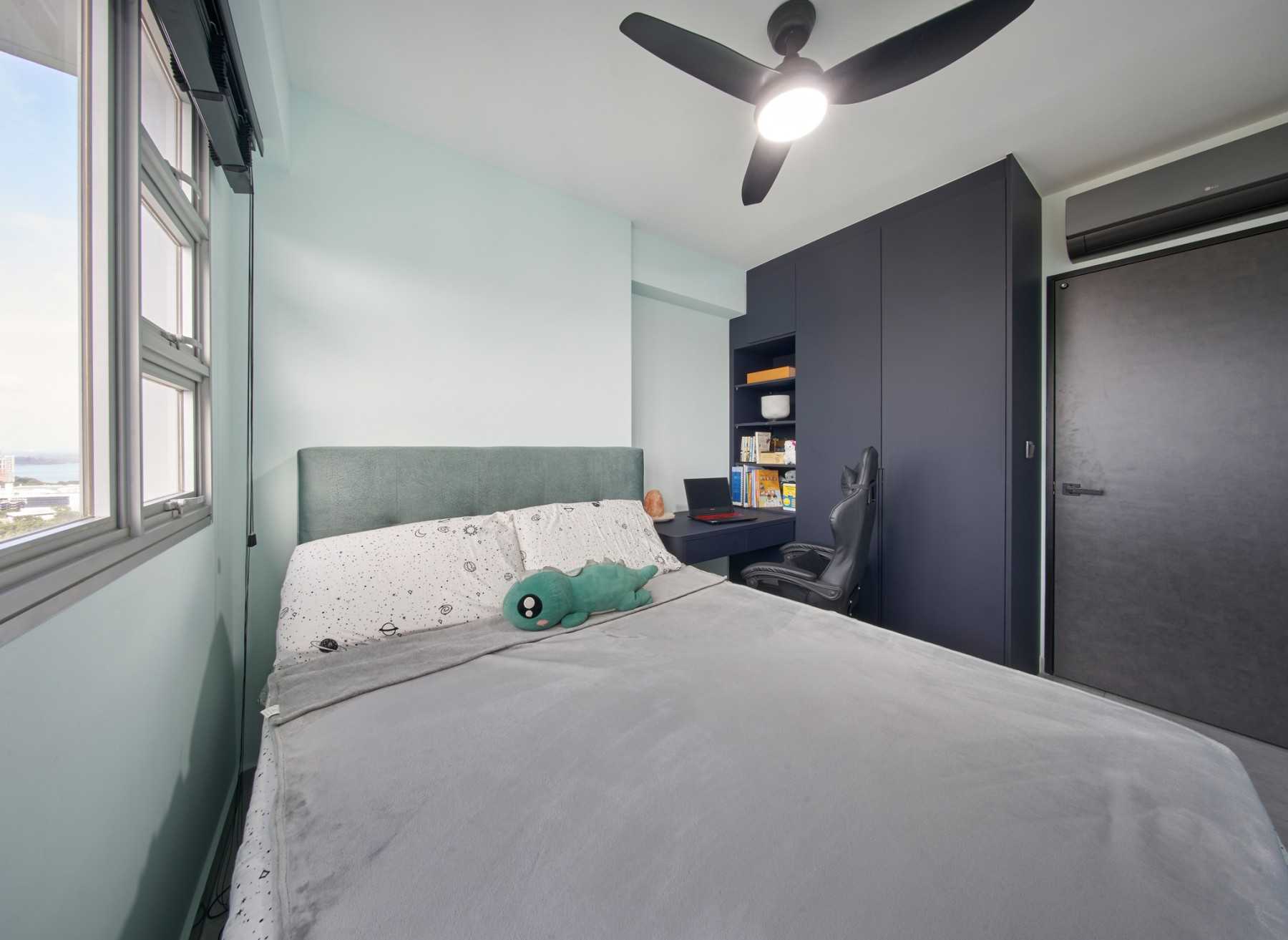 Modern Bedroom with Bookshelf and Wardrobe