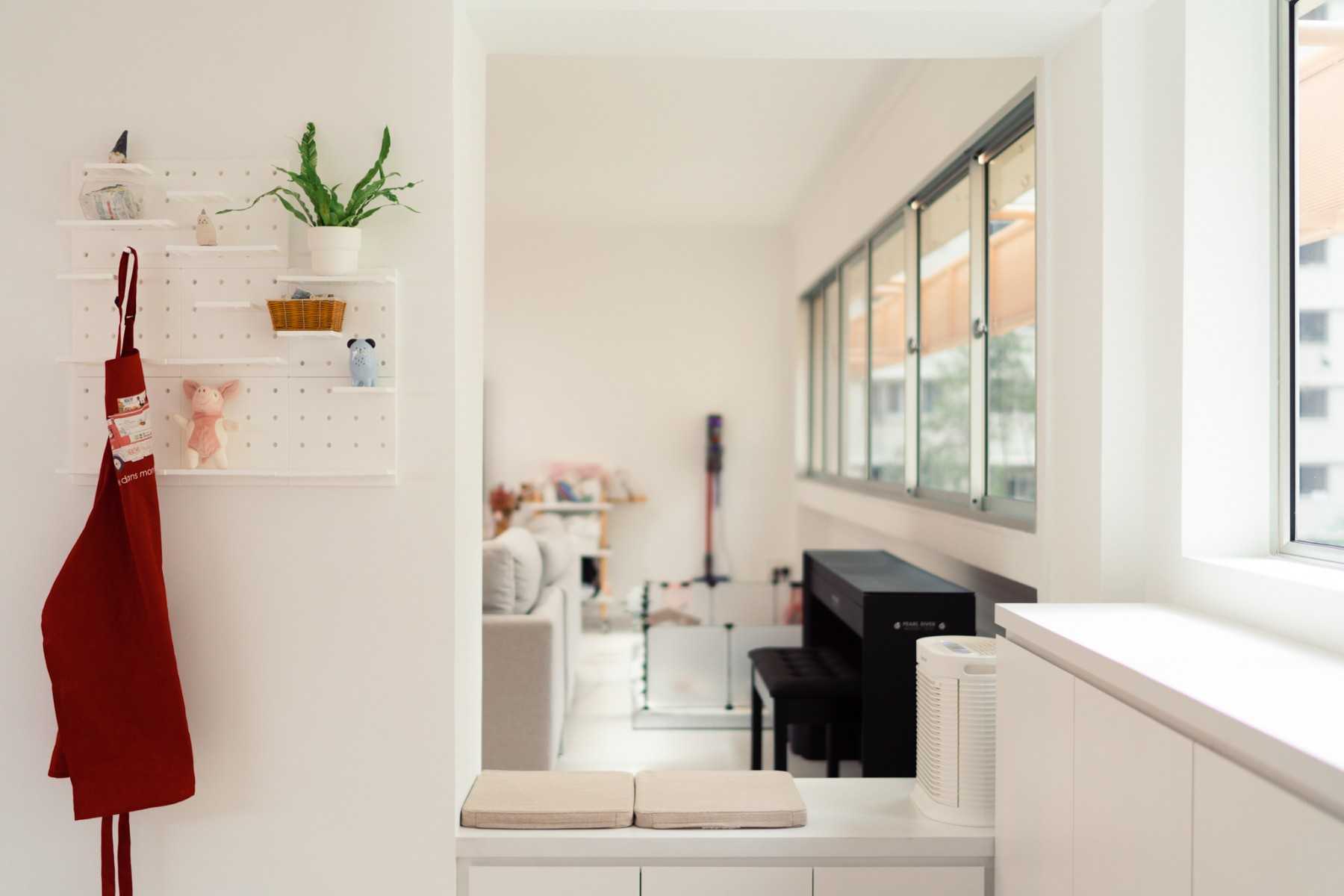 Minimalist Entryway with Sofa and Seating Bench