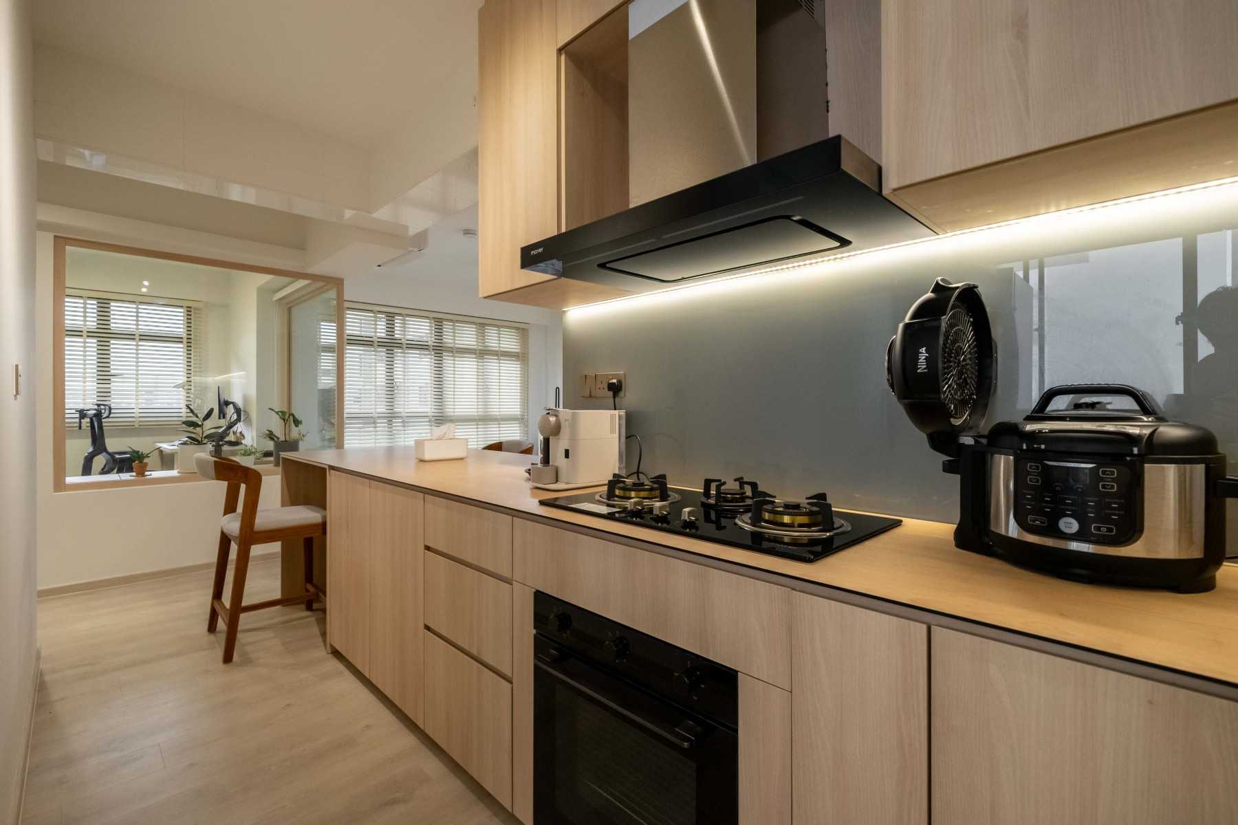 Minimalist Kitchen with Vinyl Flooring and Wood Flooring