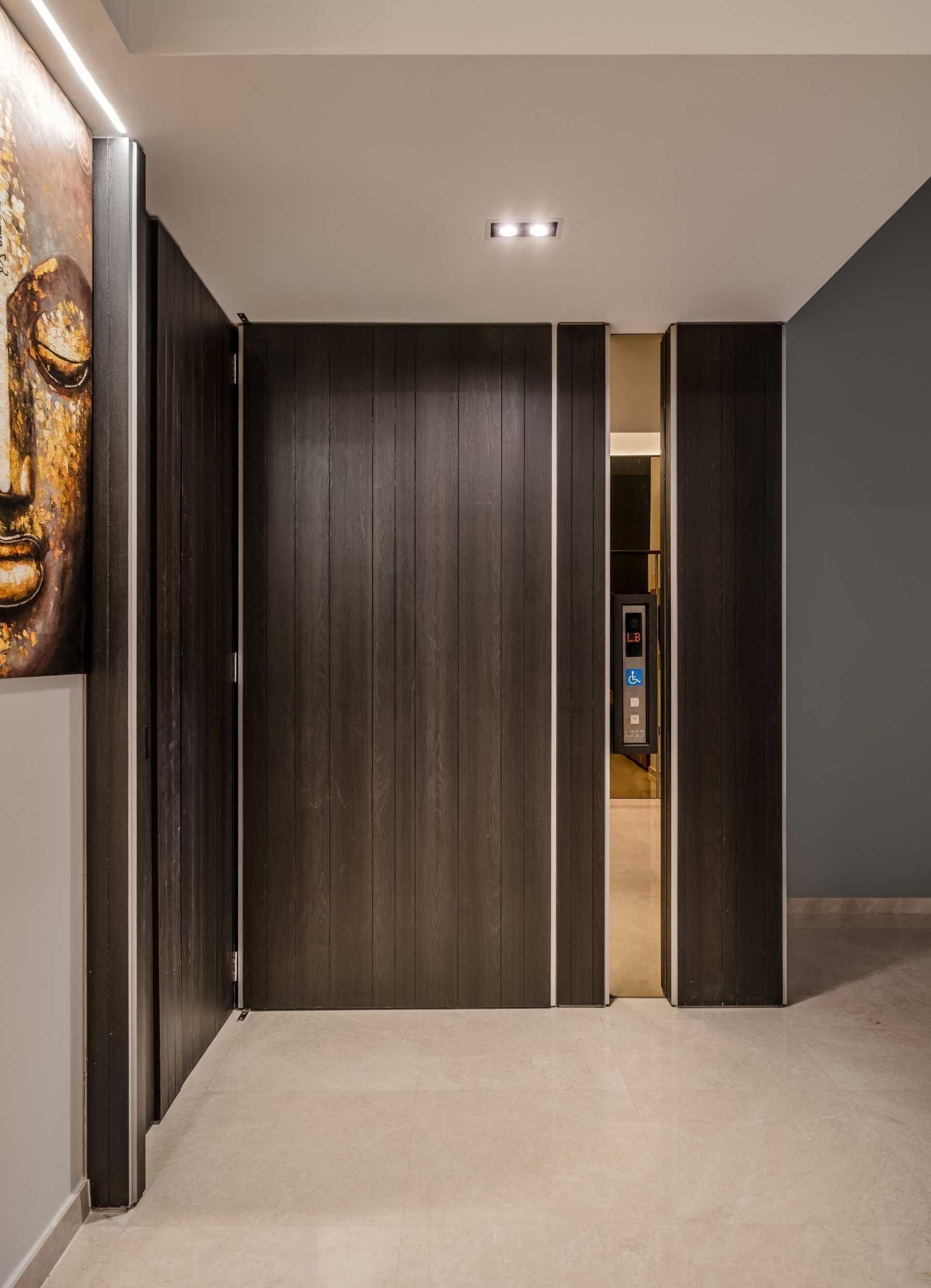 Contemporary Foyer with Artwork and Console Table