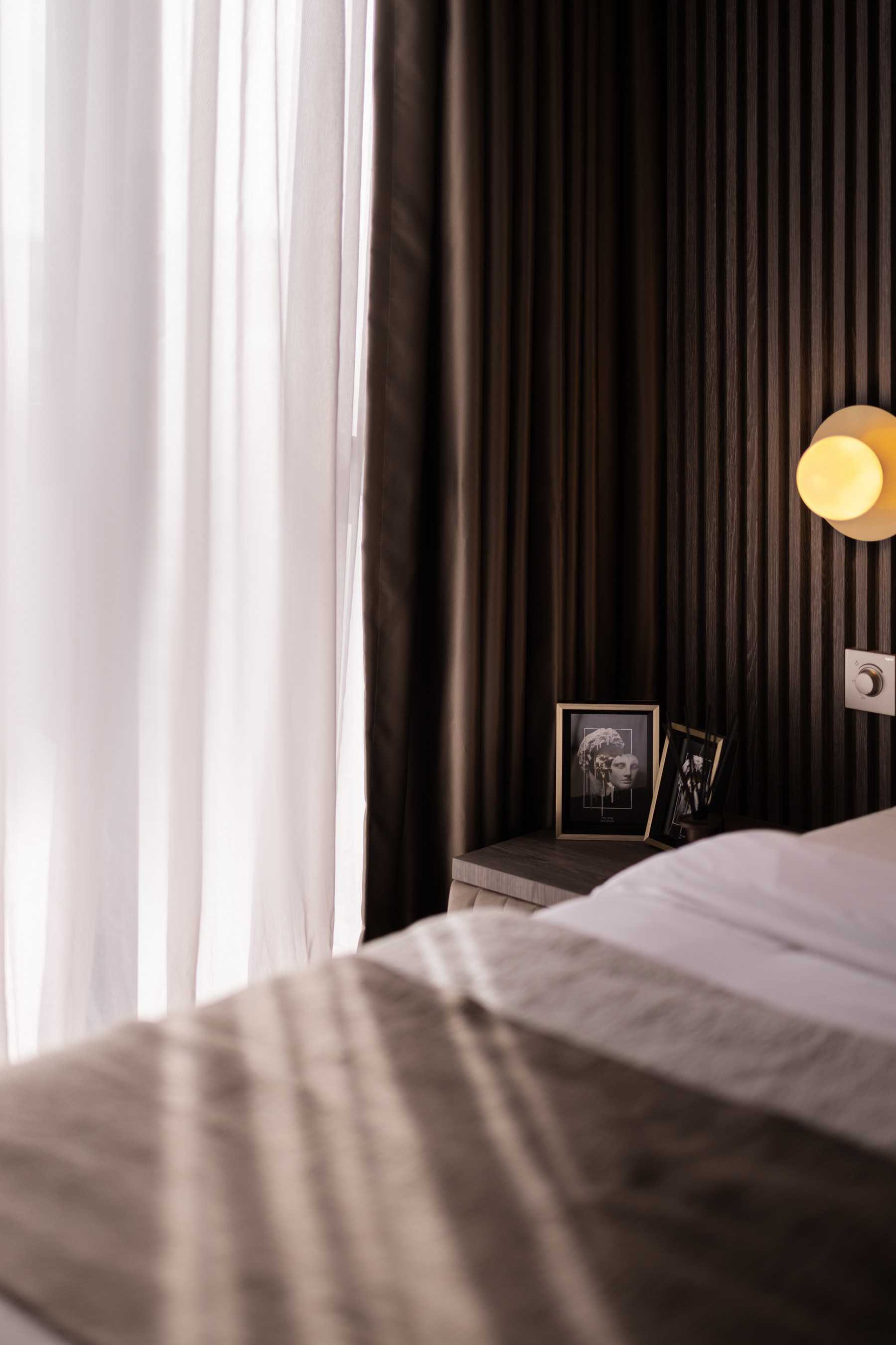 Modern Bedroom with Cove Lighting and Built-in Bed