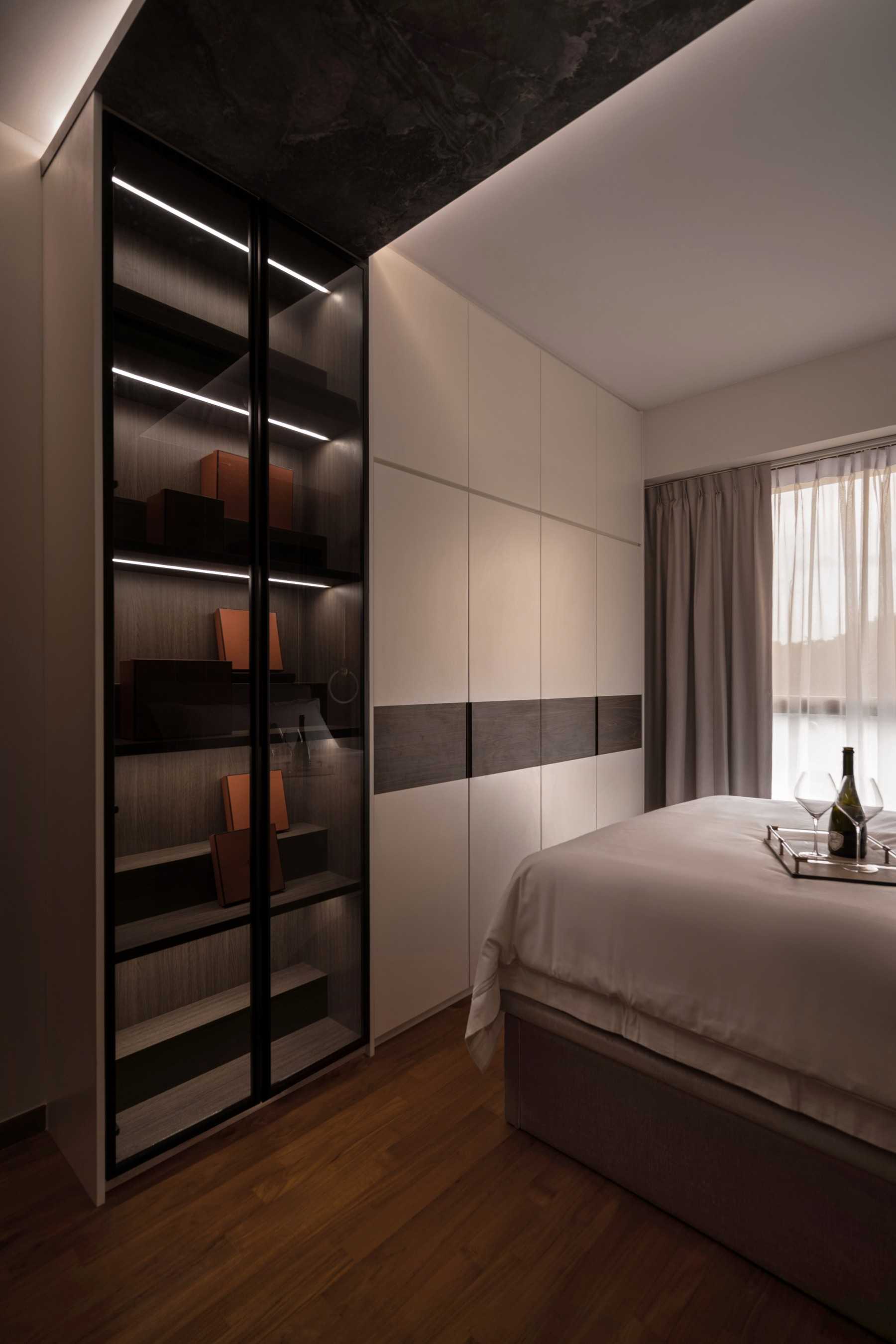 Modern Bedroom with Cove Lighting and Built-in Bed