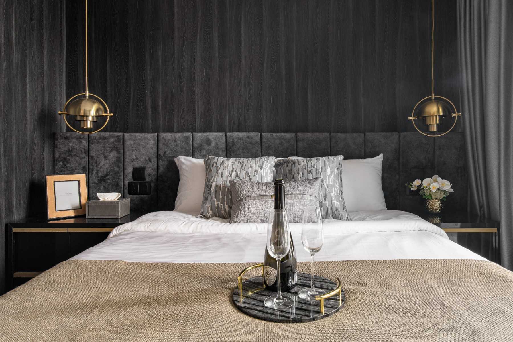 Modern Bedroom with Cove Lighting and Built-in Bed