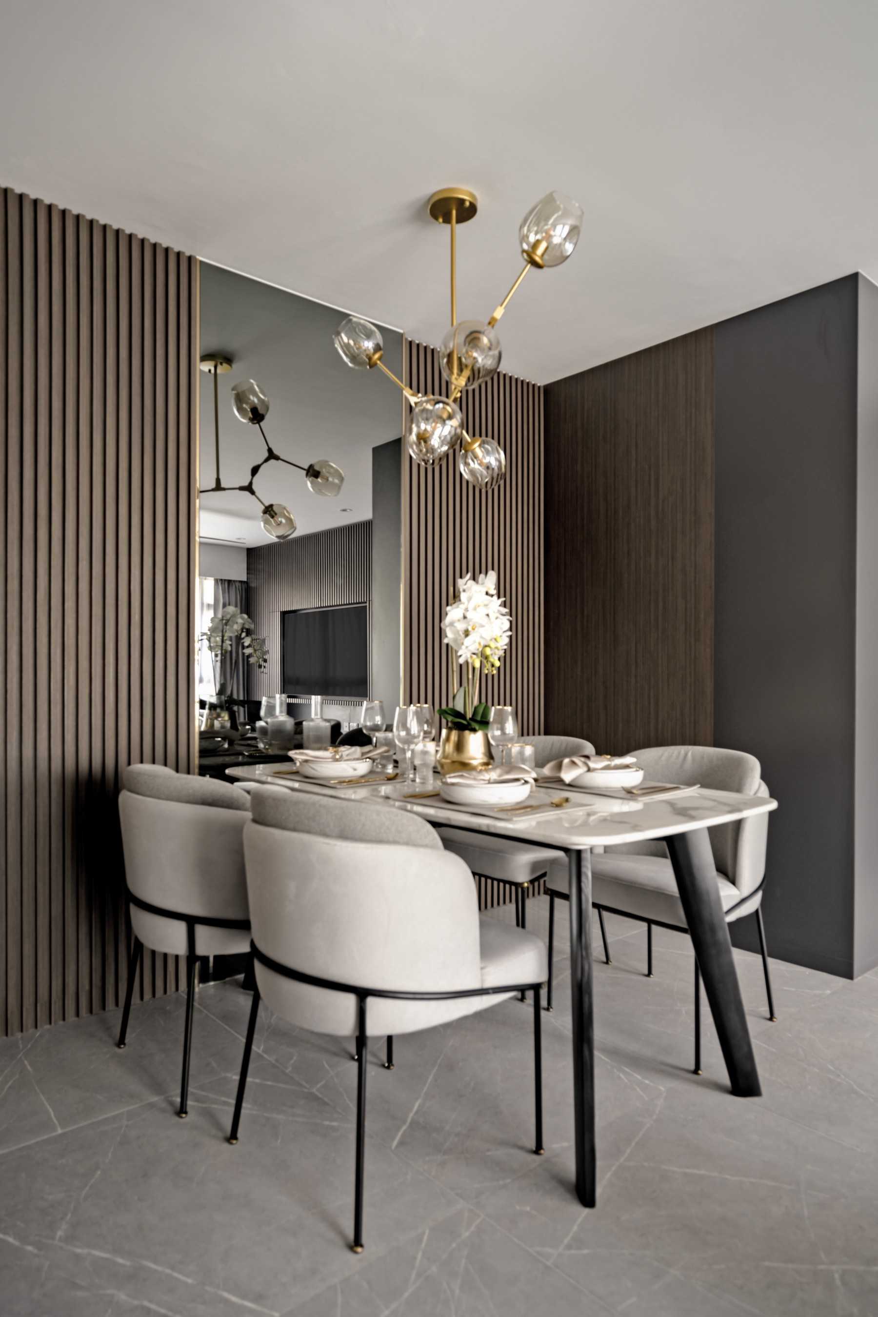Contemporary Dining Room with Chandelier and Dining Table