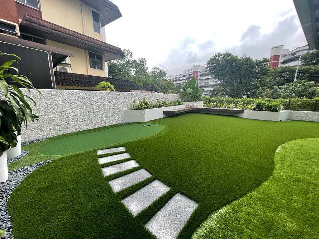 Modern Garden with Outdoor Chairs and Paintings