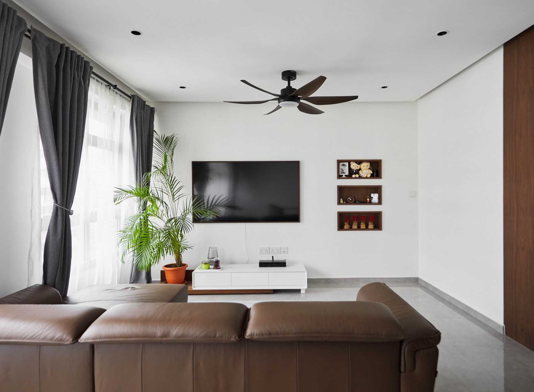 Contemporary Living Room with Bookshelf and TV Console