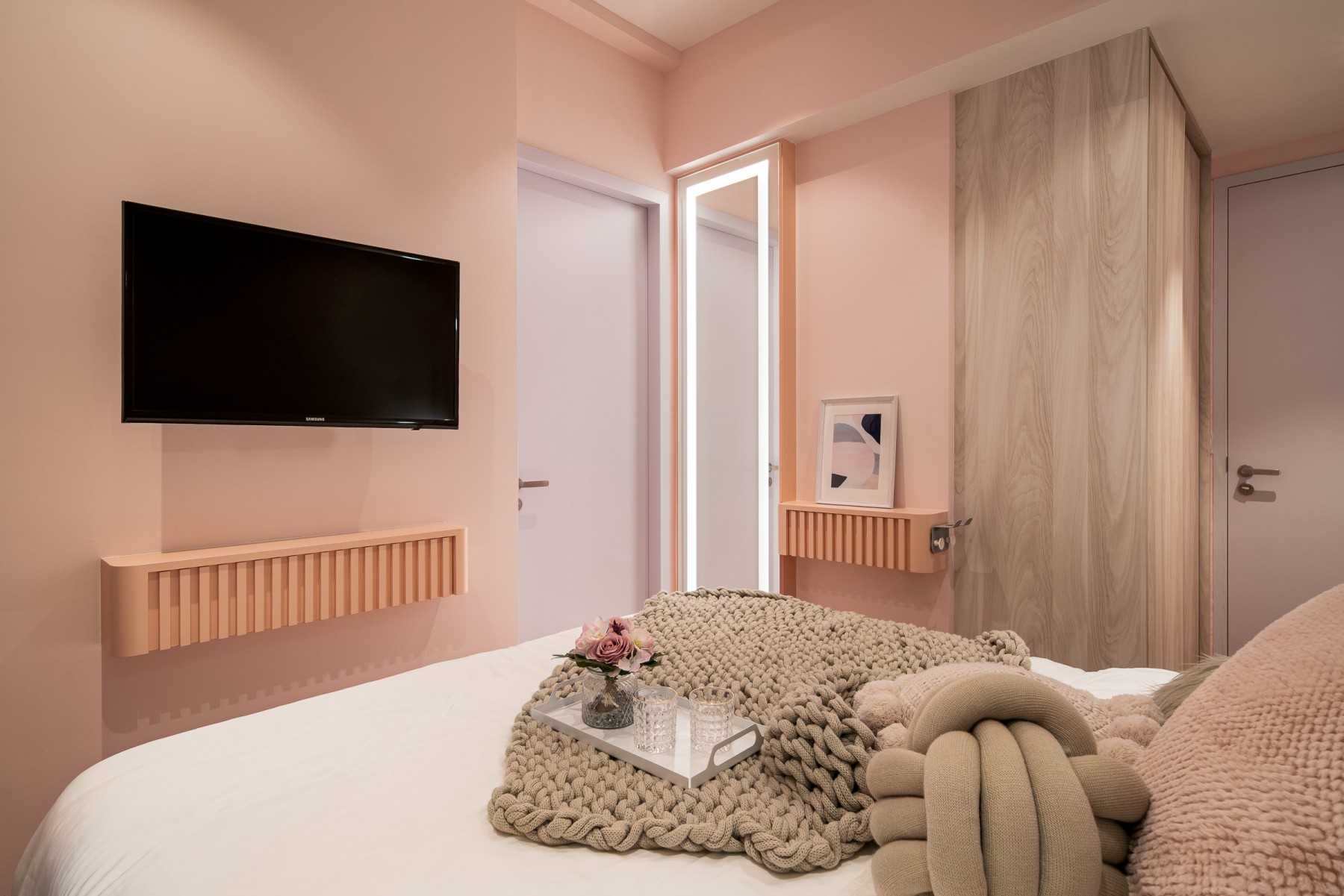 Modern Bedroom with Cove Lighting and Built-in Bed